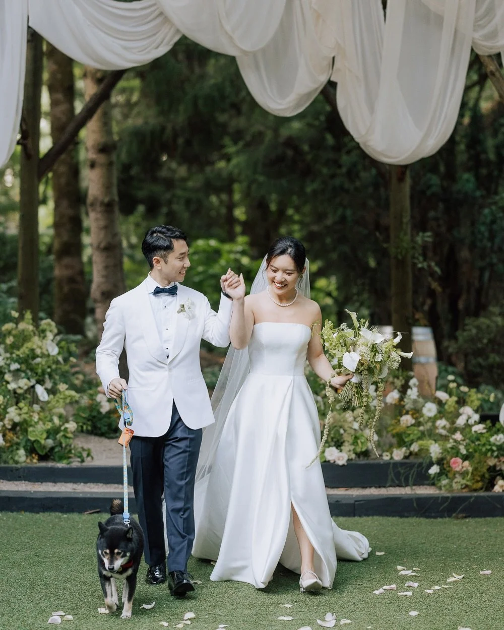 Some stories deserve to be revisited.
Some weddings feel loud. Some feel like a quiet memory unfolding.
The forest was still that afternoon in Seattle. Light moved gently through the trees, conversations softened, and time seemed to slow down &mdash;