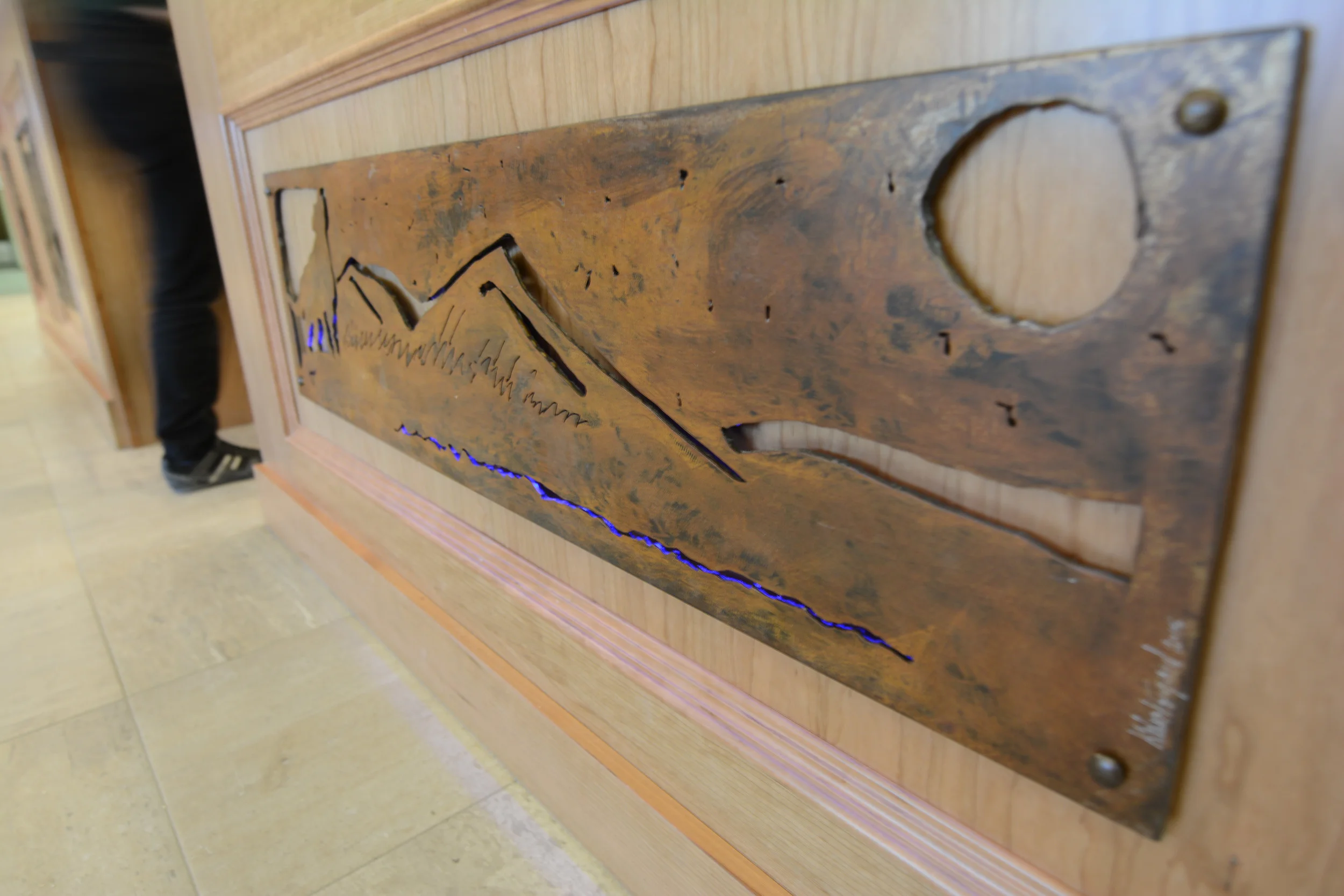 Design and metal cutouts of the mountain by Kurt Westergard /owner Harmony Home Projects Inc.