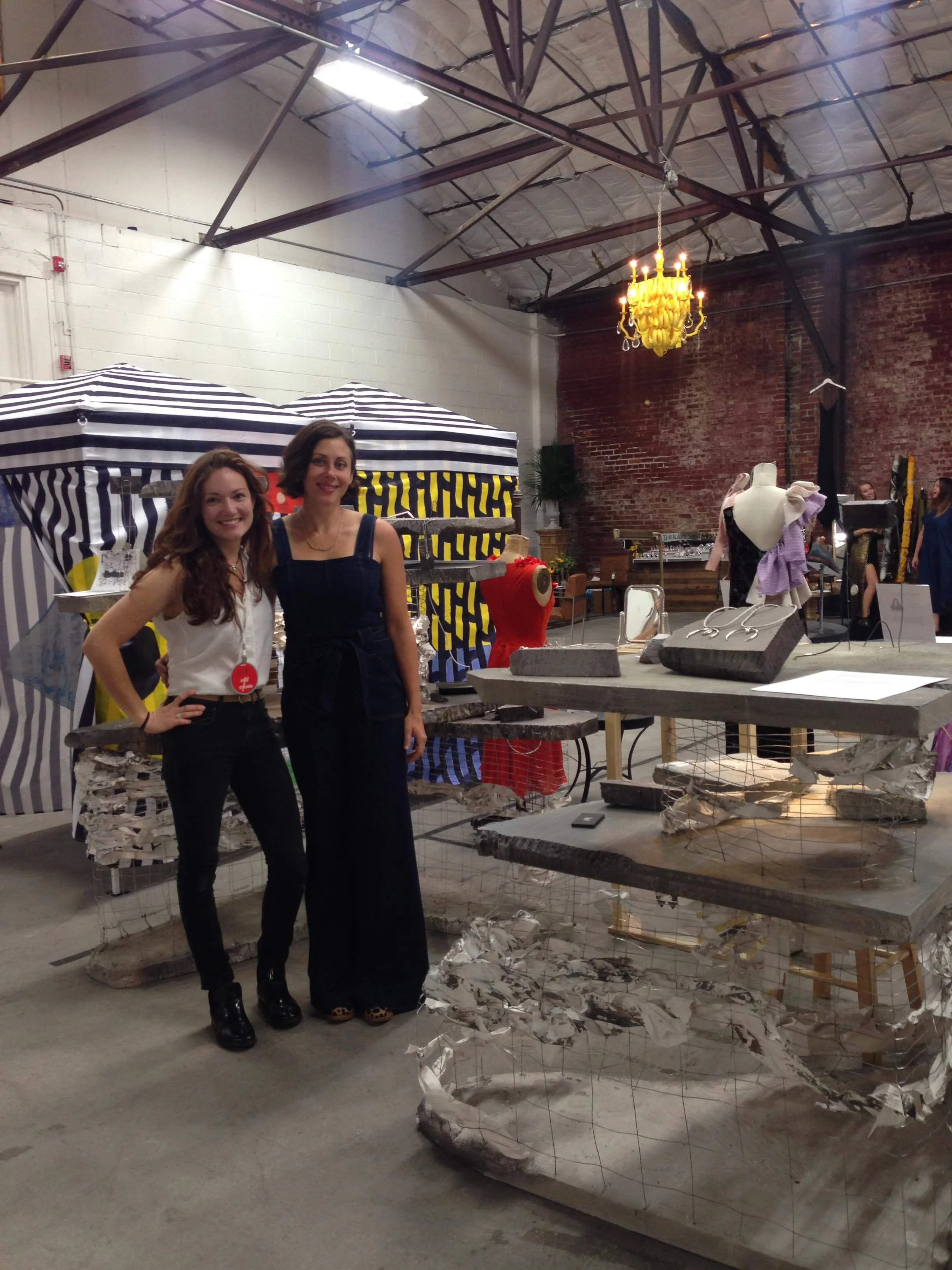 Erin and me standing in front on the gorgeous installation at The Wardrobe Project in Nashville