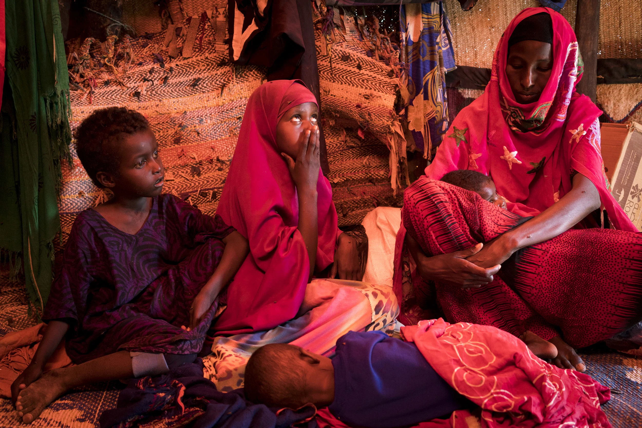 Severely malnourished, Farhiyah, age 2, lies on the floor of her family’s hut where she stays with her three siblings and mother who came to the area in search of food and water in Uusgure, Puntland, northern Somalia, February 18, 2017.