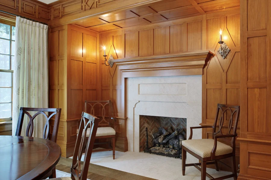 the inglenook during the install. Accessories not yet unpacked. sconces are by David Iatesta. Chairs are by Hickory Chair. the honey cypress truly glows in this image. 