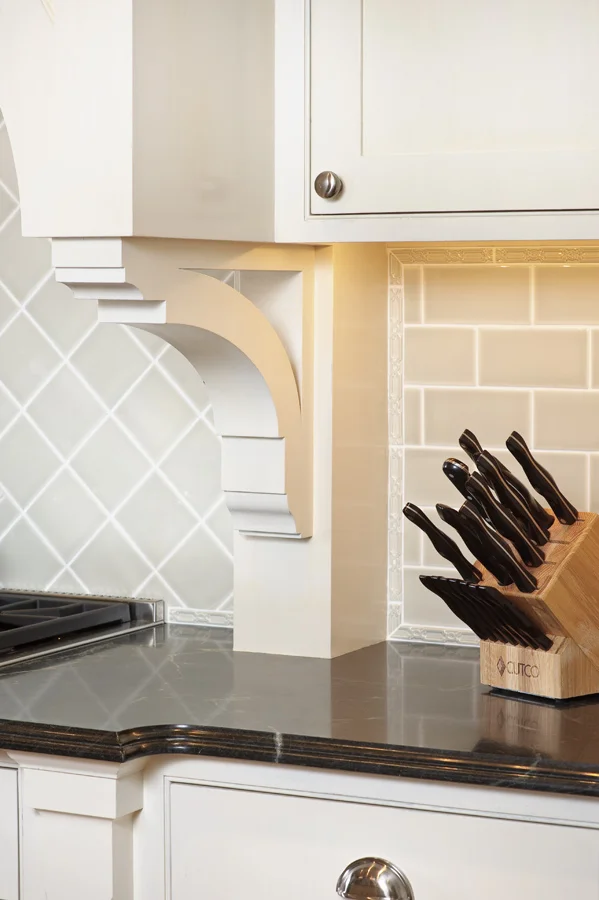 Celadon tile, soapstone, and a fretwork tile border.