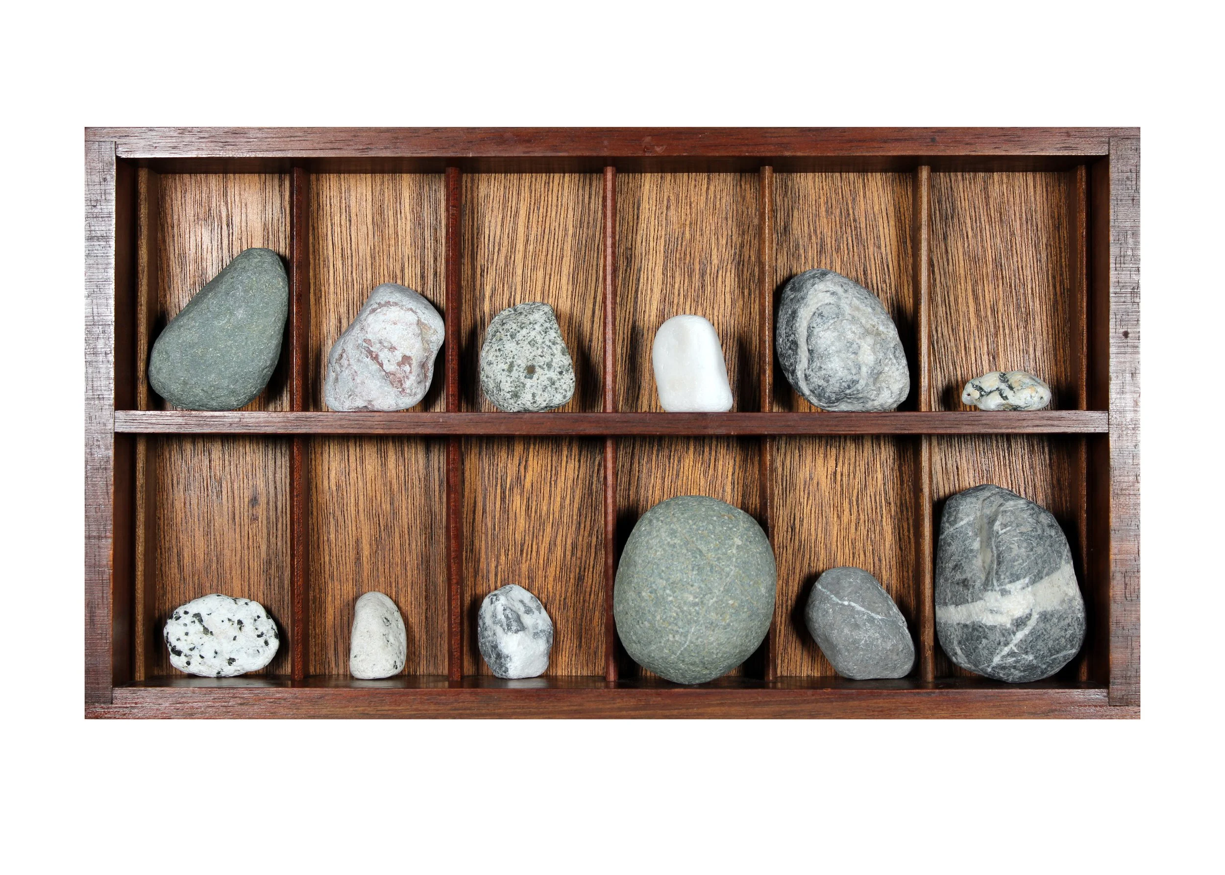    Cloak (interior unit),   2026  Found objects (vintage wooden rack, rocks)  8 1/4 × 15 × 2 1/4 in  Component of site-specific installation   