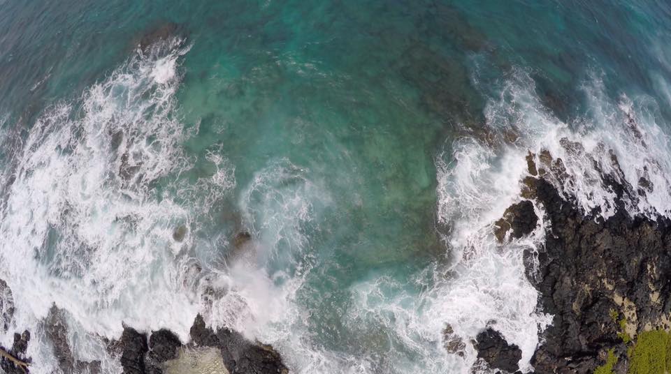 This photo has some pretty severe fisheye distortion of the waves and coastline. It was shot on a Hero 4 from a drone just outside Honolulu, Hawaii