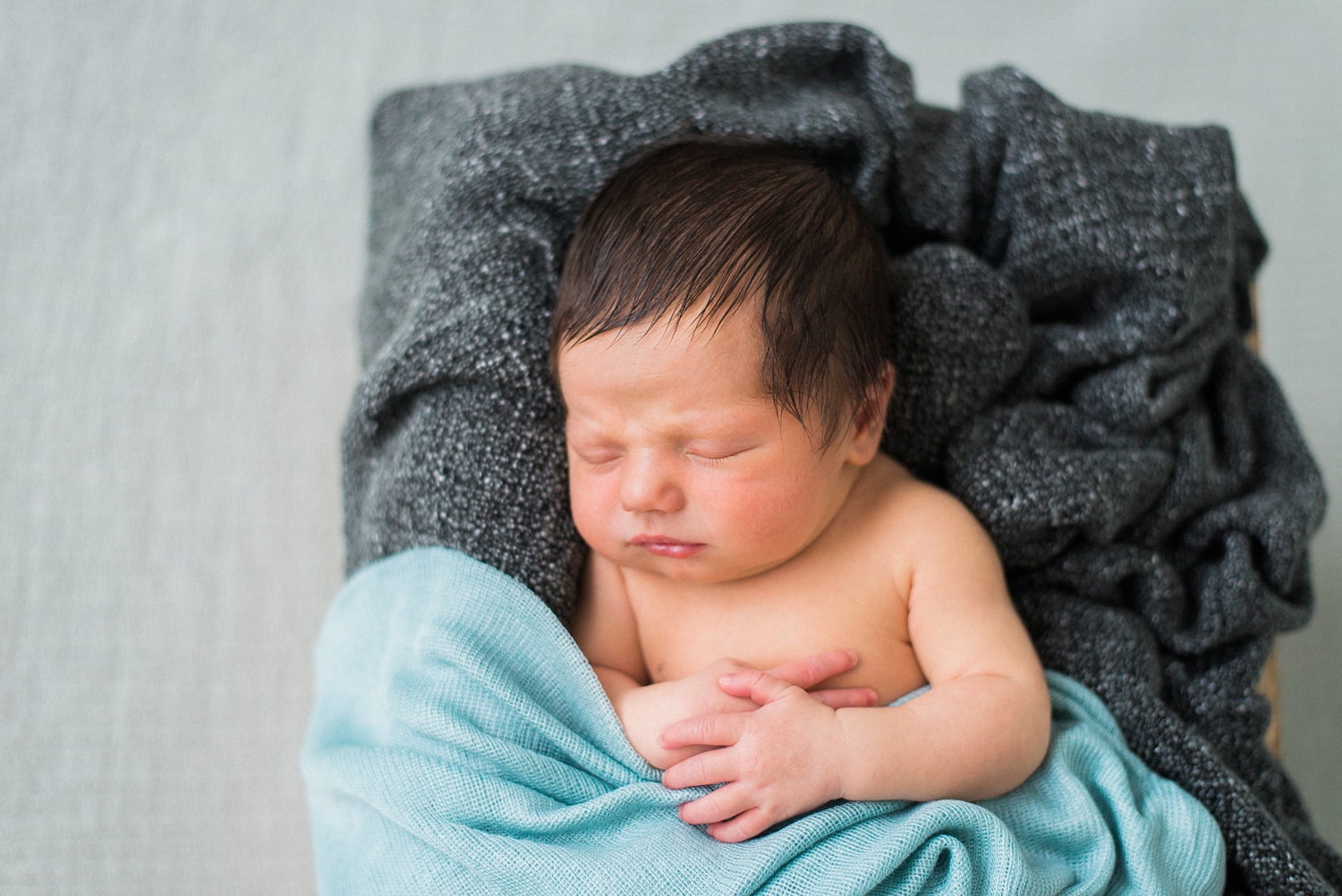 best-portland-oregon-newborn-photographer-sleeping-baby-boy-in-basket-shelley-marie-photography.jpg