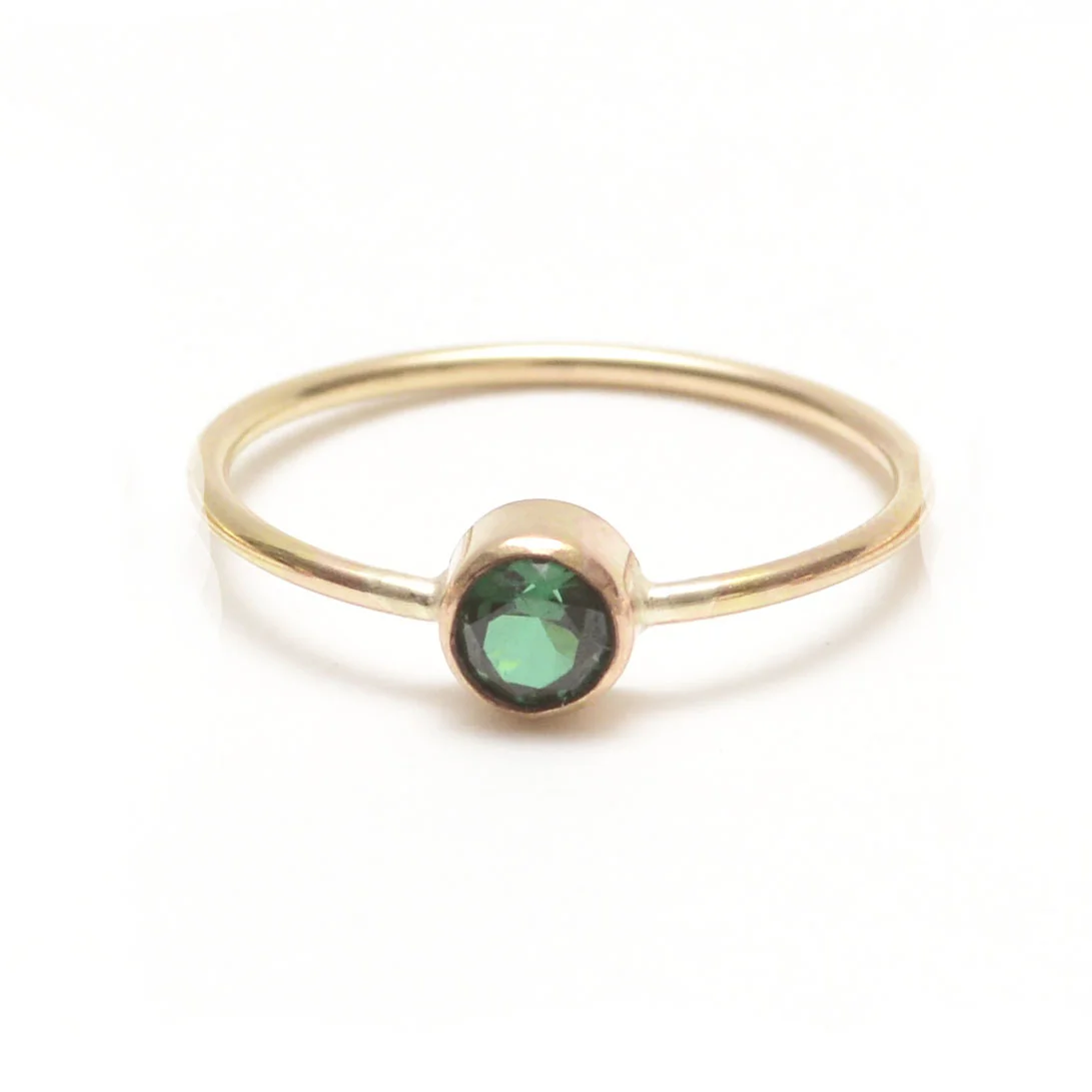 Simple Emerald Circa Ring from Favor Jewelry