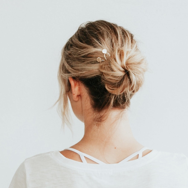 A minimal hair pin featuring a single dot of metal is perfect for tucking up smaller pieces of hair.