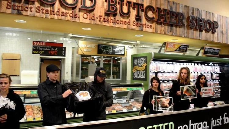 Direct Action Everywhere's protest in Salt Lake City, Utah. Protesting against the "humane" advertising slogan placed on meats at various upscale grocery stores. Exactly what is their definition of humane slaughter?