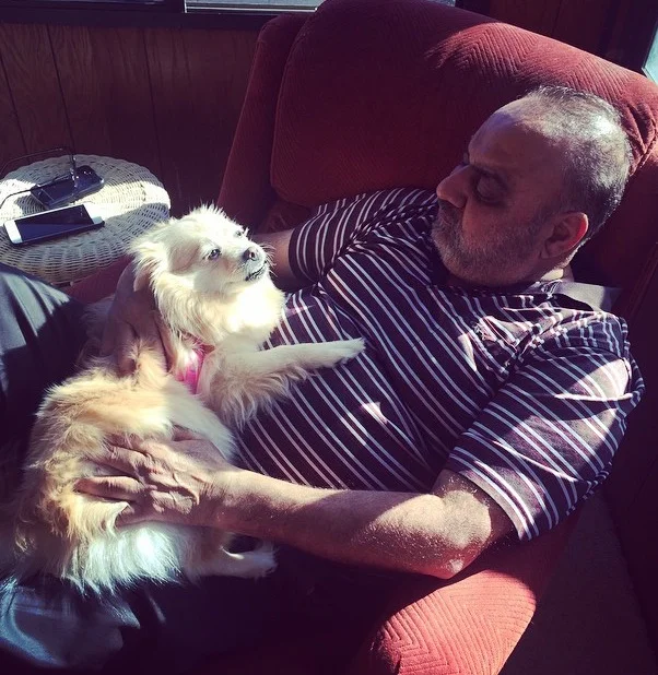 My Dad cuddling with Mimi.