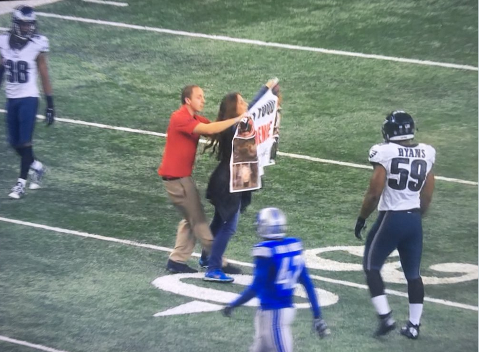 Animal-rights protesters run onto field as Eagles-Lions game is ending
