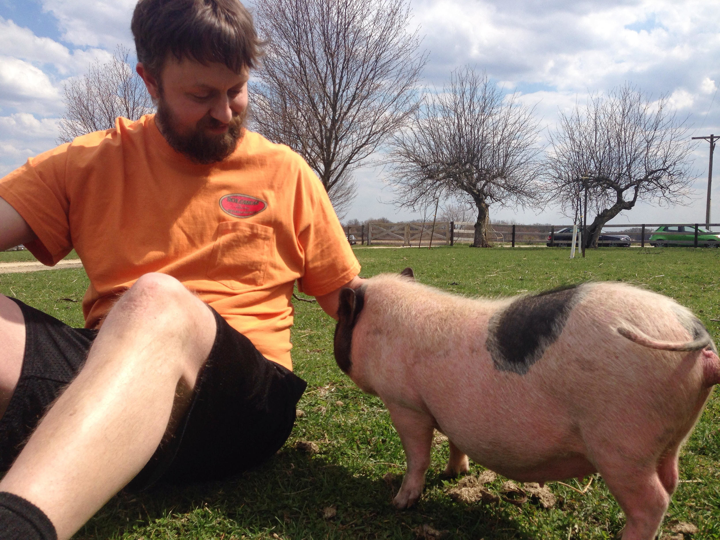 Paul hanging out with a pig