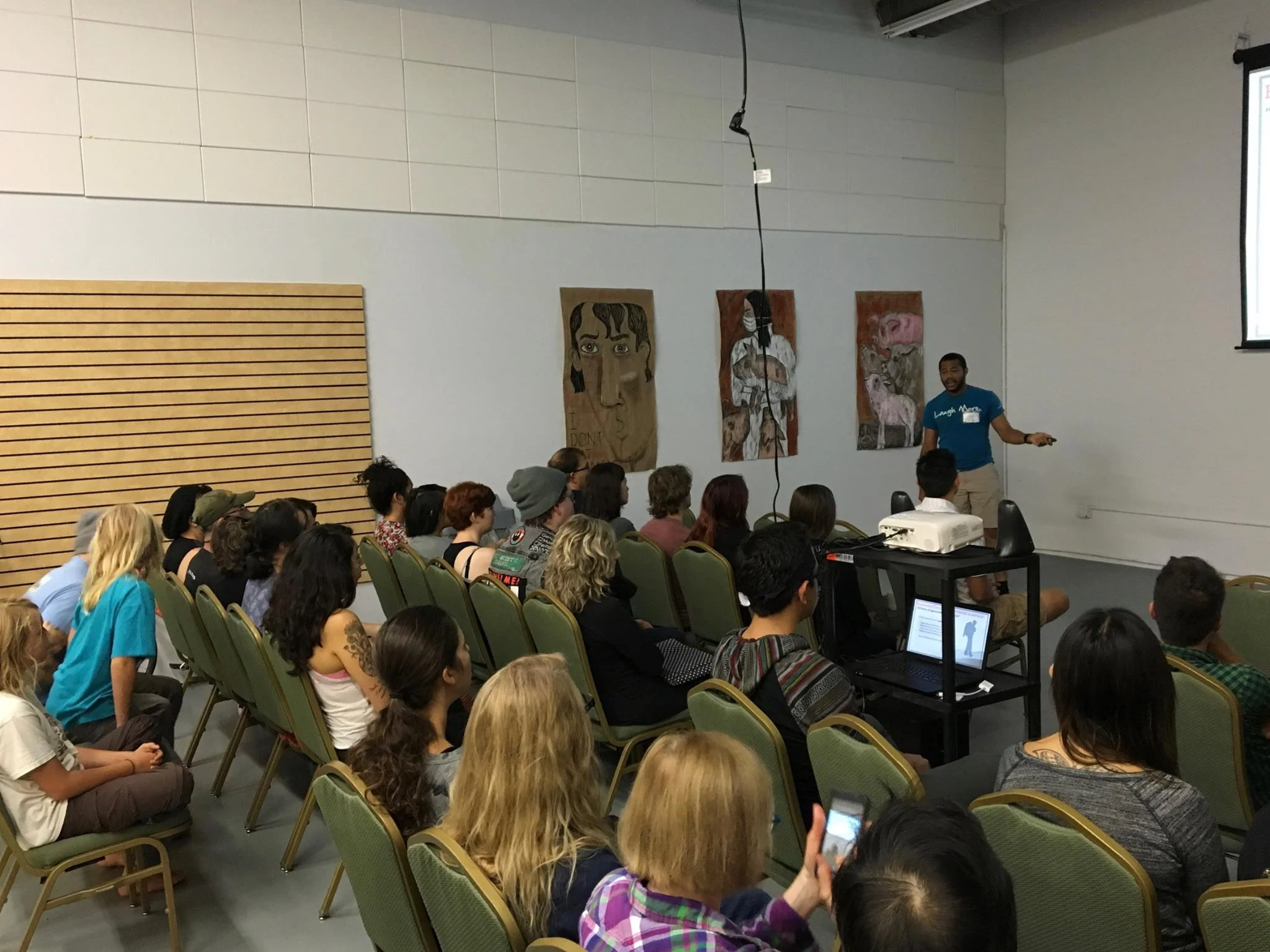Community members participate in a public speaking seminar.