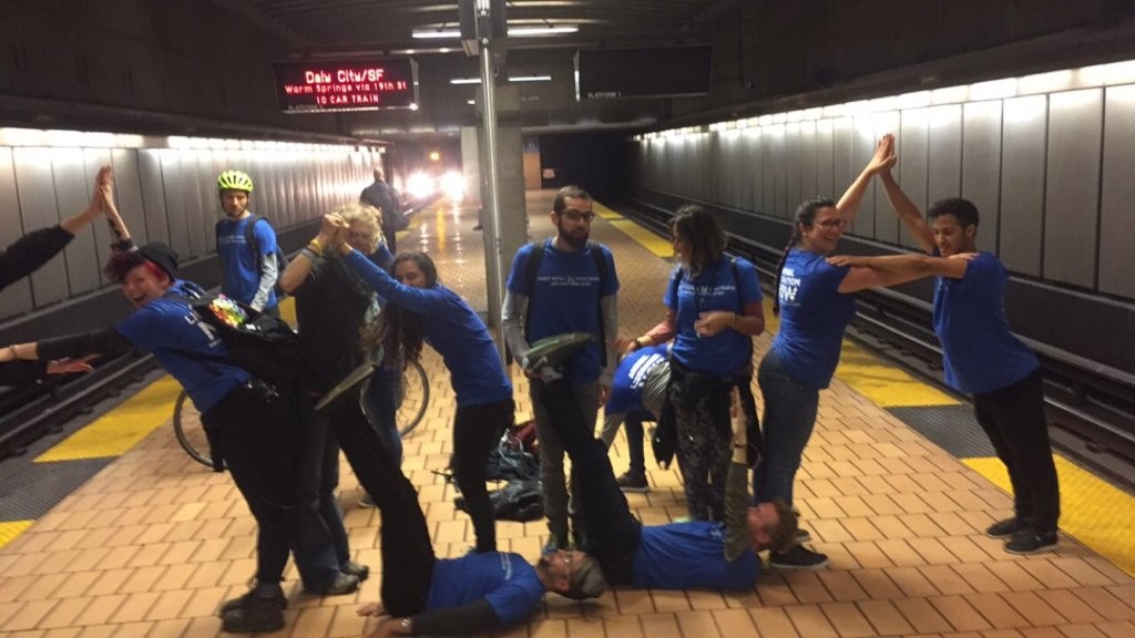 Some DxE members of an activist house attempting to spell out "AQUA"