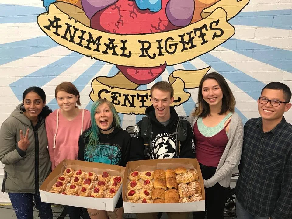 Activists enjoy vegan pastries at the Berkeley Animal Rights Center.
