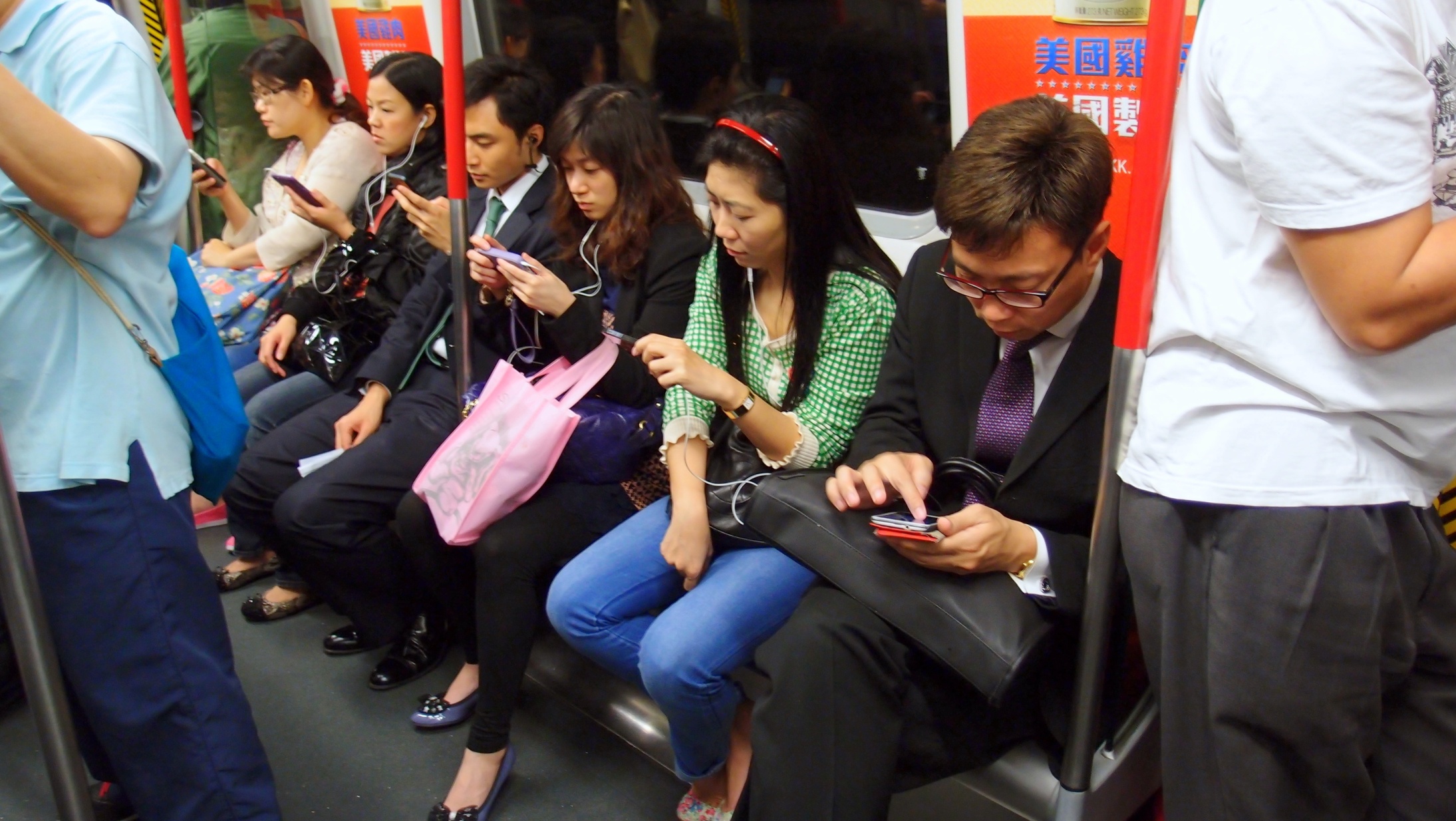 I imagine this scene is played out in all cities, citizens using their smart phones, nobody talks anymore!