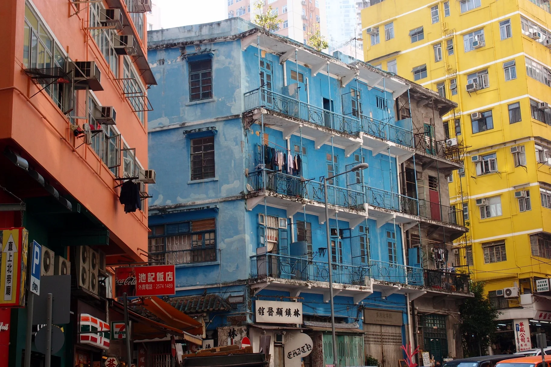 The Blue House located at Stone Nullah Lane in Wanchai and legend has it the families living in there use buckets as toilets and pay an old codger to remove the waste every day!
