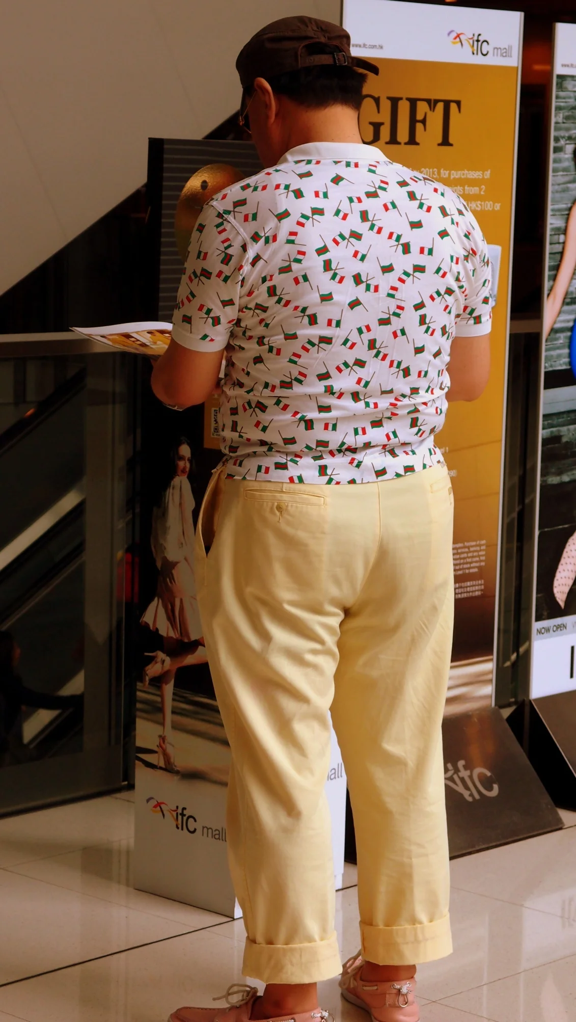The pudgy guy in the pink shoes