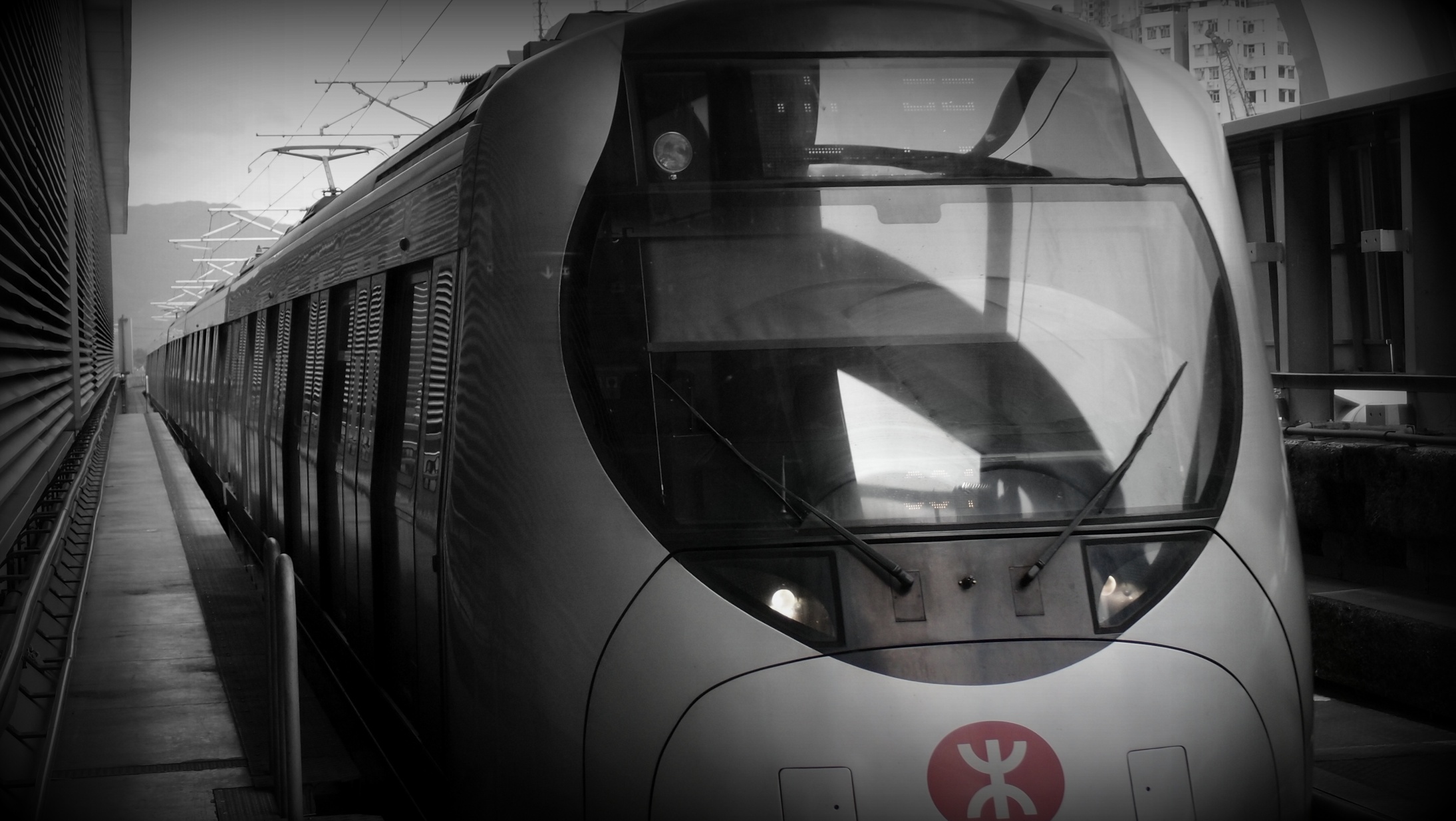 MTR train arriving at Long Ping Station