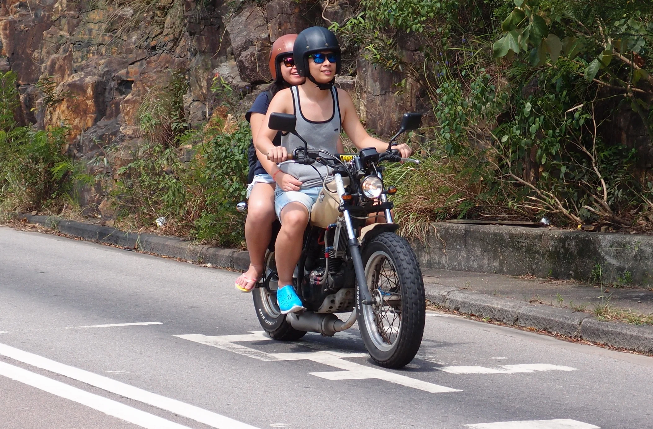 If her hand was just a bit further down he really would have a reason to smile - on the road near Stanley.