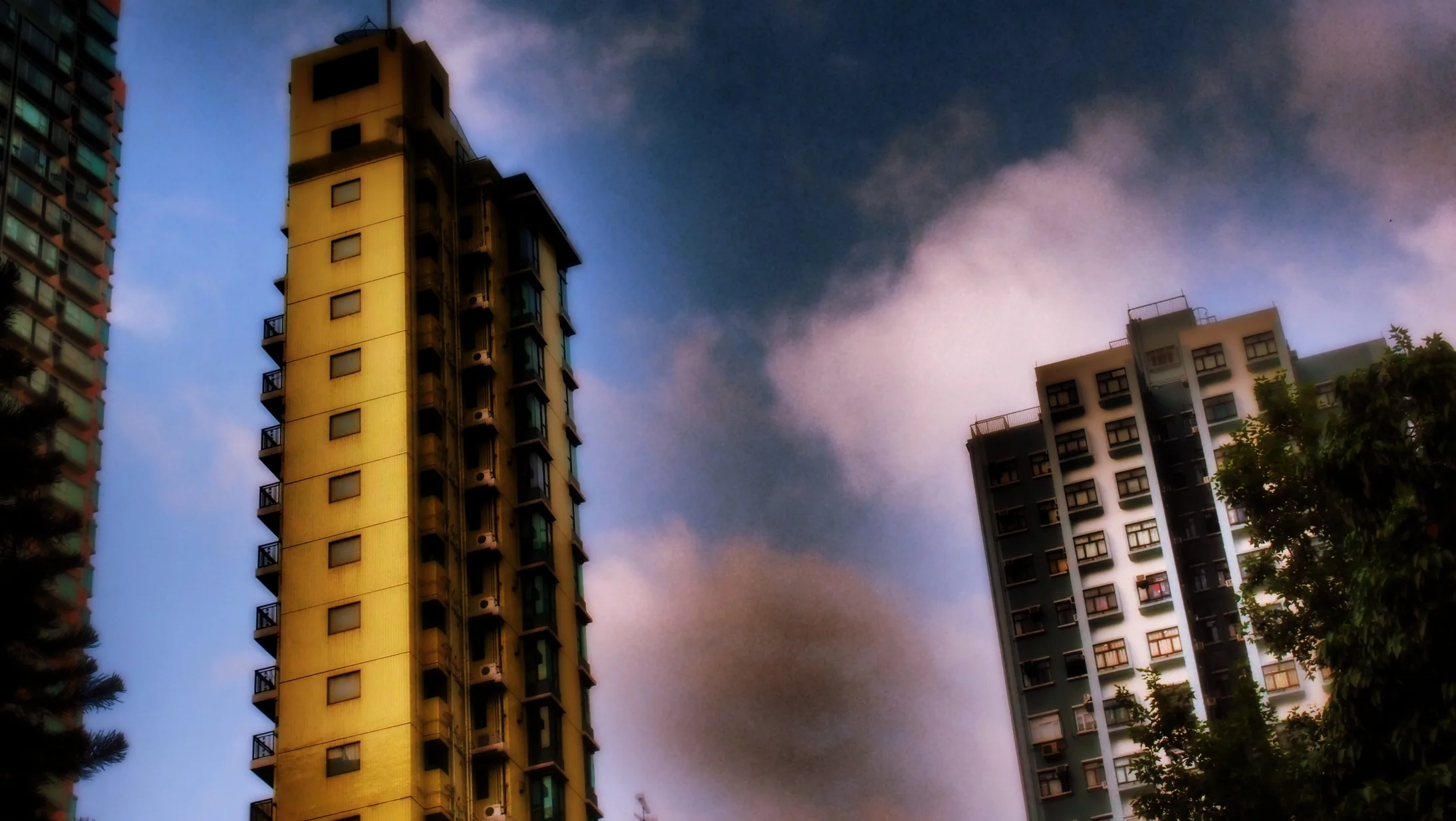 A moody atmospheric shot of buildings at the Western end of Hollywood Road