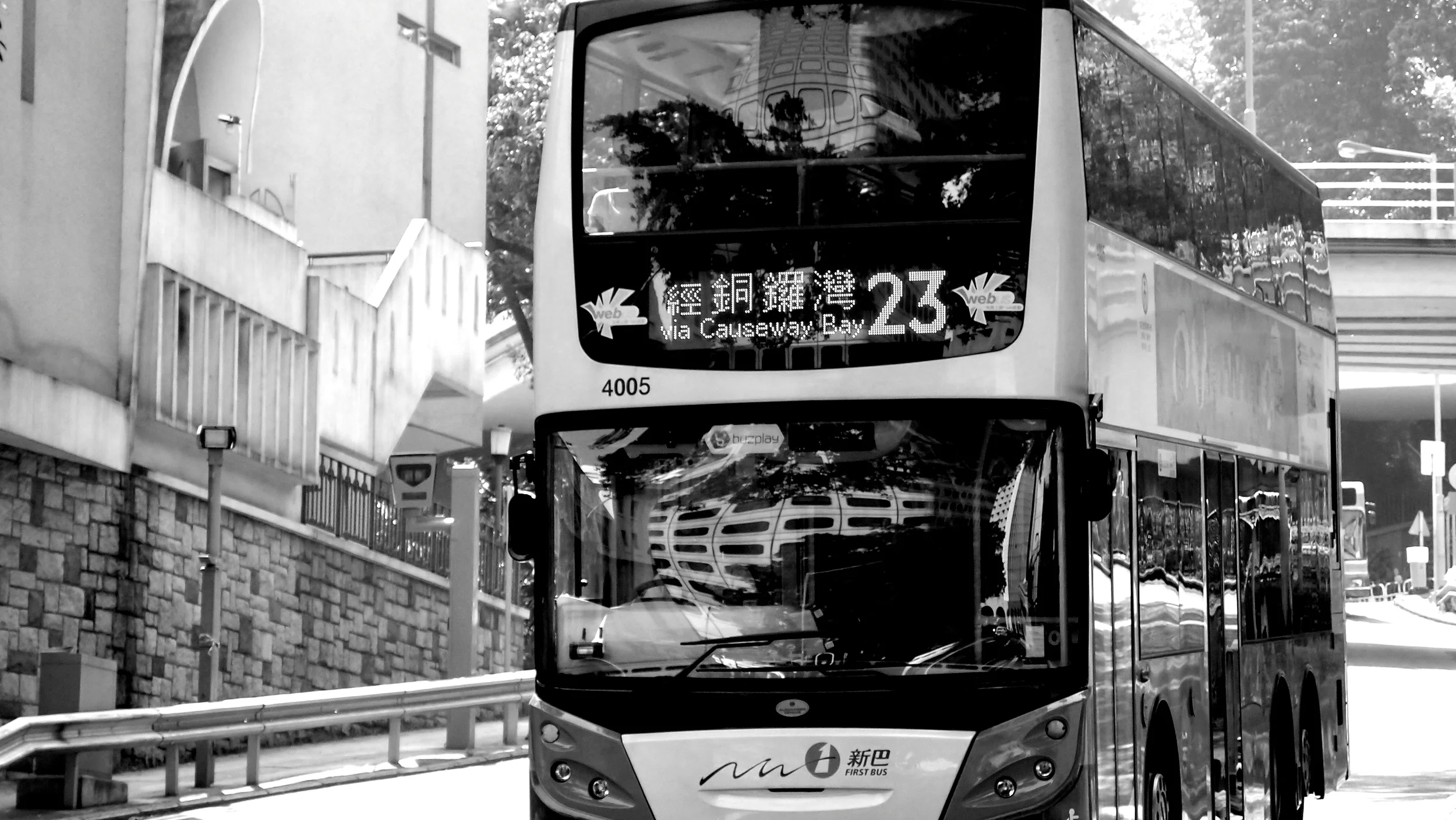 The No. 23 bus hurtling down Garden Road by St. Joseph's Church.