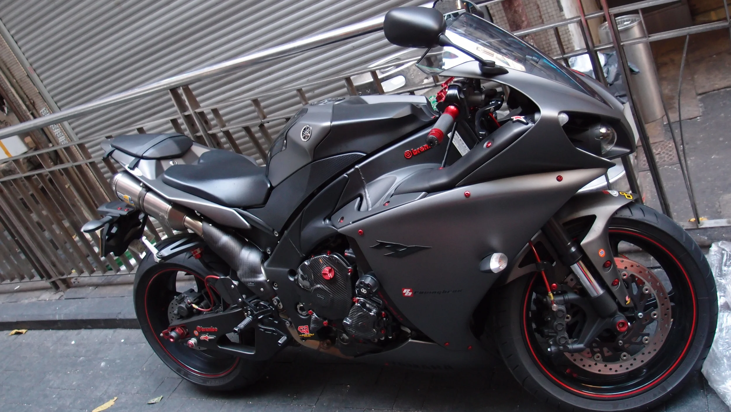 I am not an expert on motorbikes but I believe this is the special Yamaha Brembo R1 motorbike and it rocks!