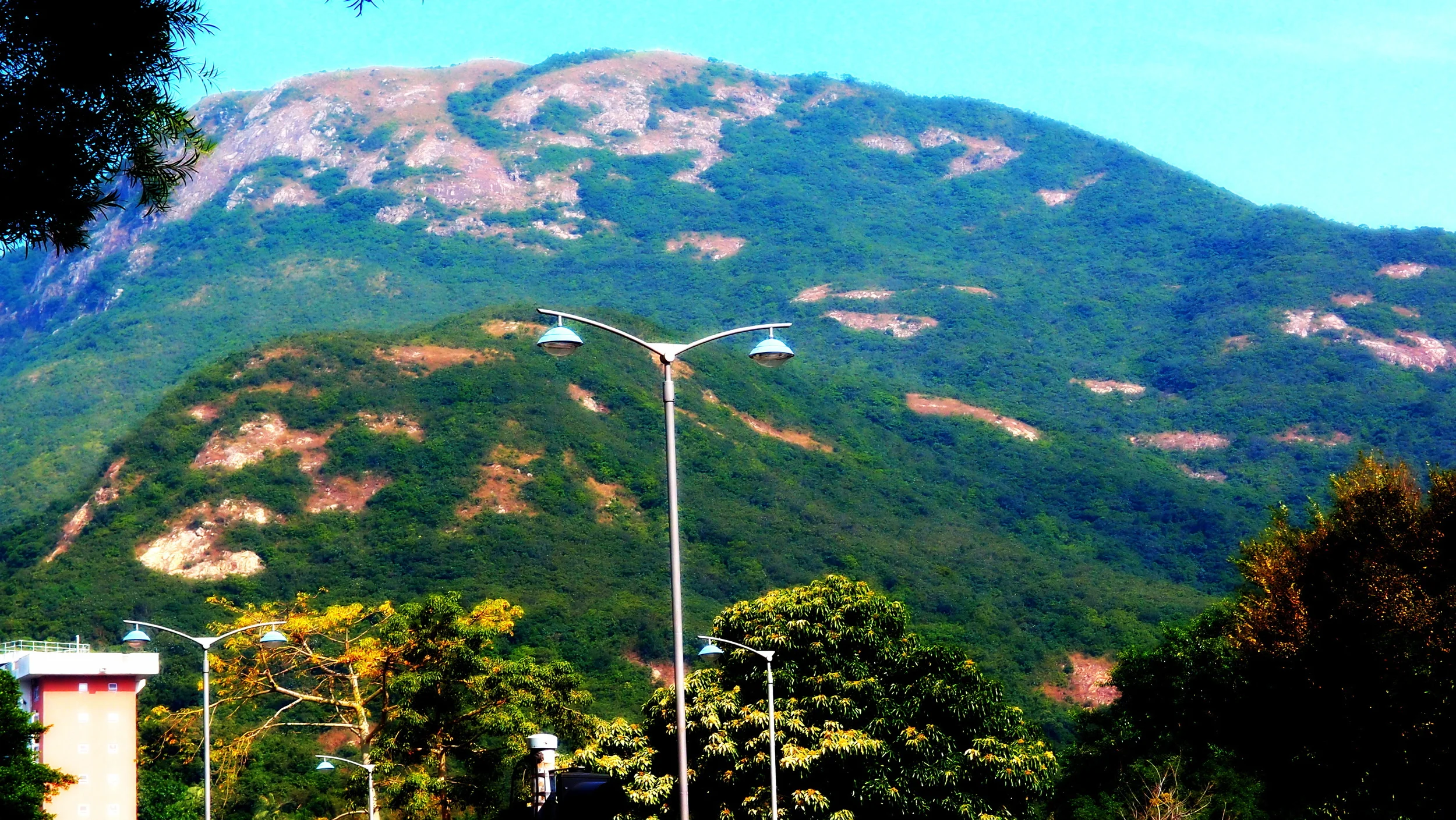 Looking towards the back of the Peak and surrounding hills from Pokfulam on the South West side of Hong Kong Island