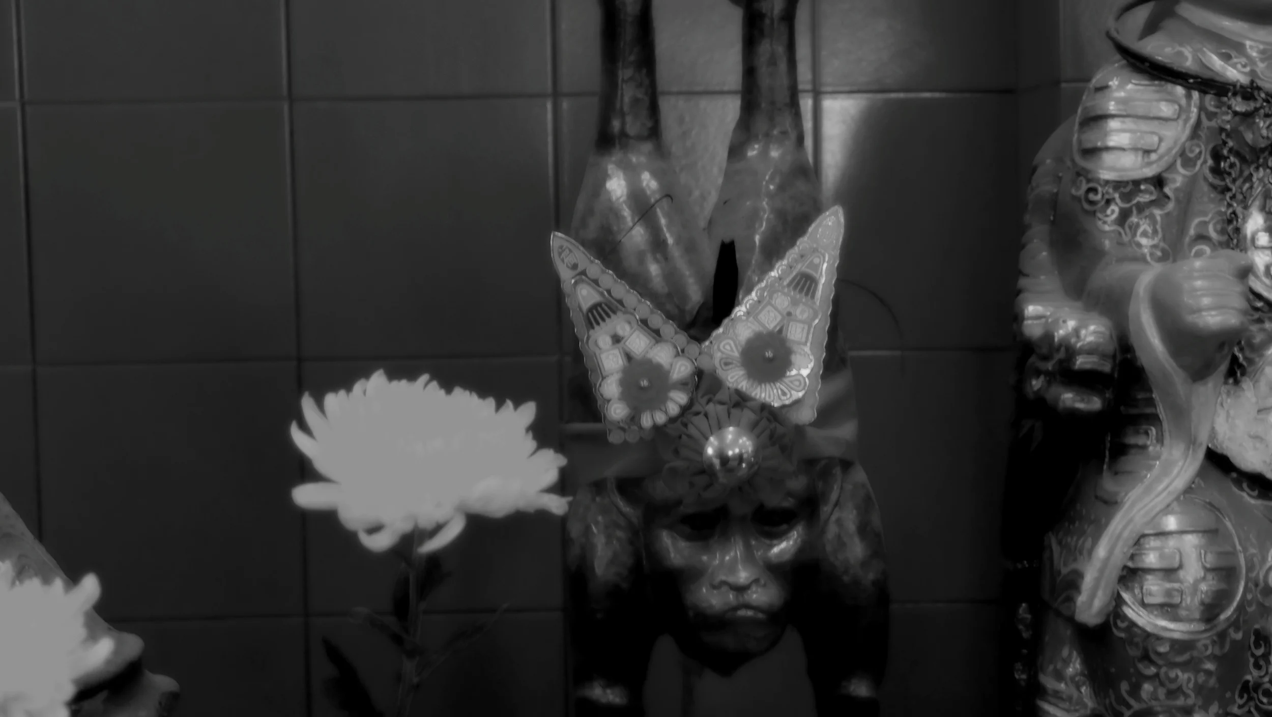 Yes, the monkey god has a wooden pole up it's ar.e! the expression on the face is priceless