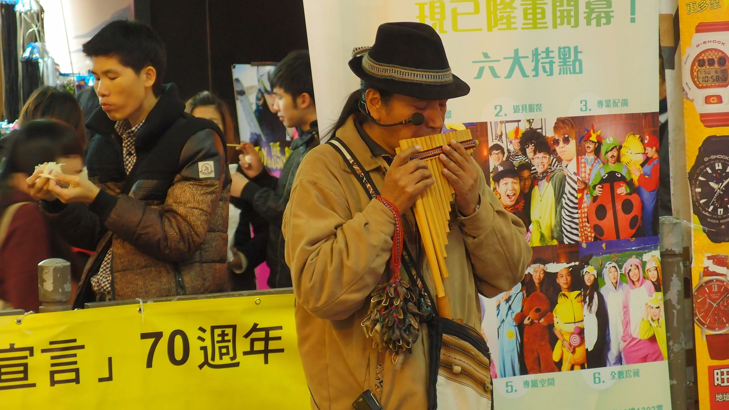 A one man Peruvian pipe band busking in Hong Kong