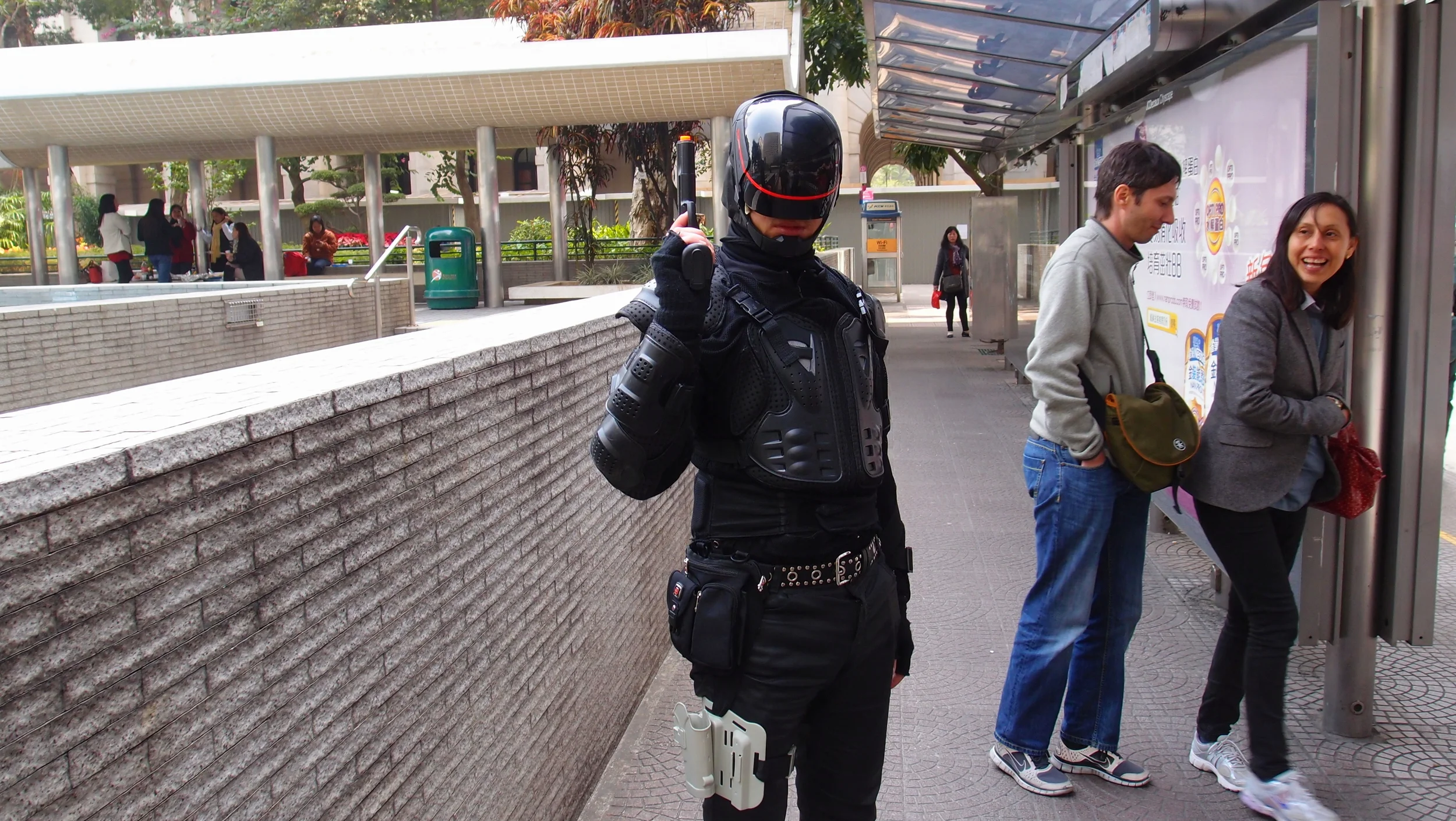 We quite often get idiots walking around the streets of Hong Kong in fancy costume - this nutter dressed as Robocop is liable to get himself shot dead if he wafts the gun around near a copper, they are not known for their sense of humour when it comes to guns!