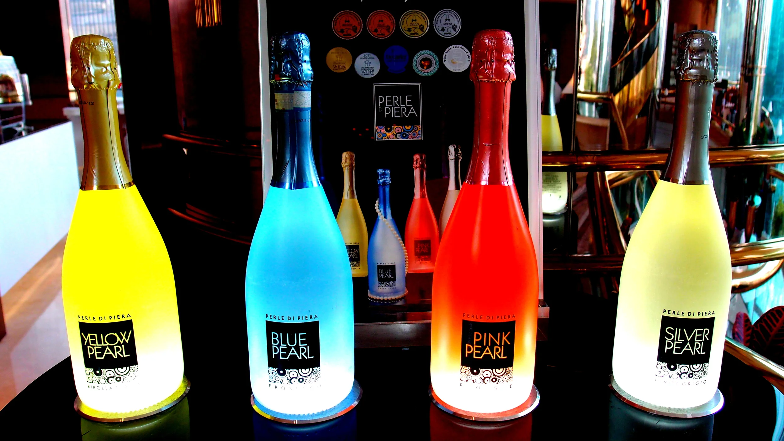 Bottles of stuff that presumably give you a hangover in glorious colour.