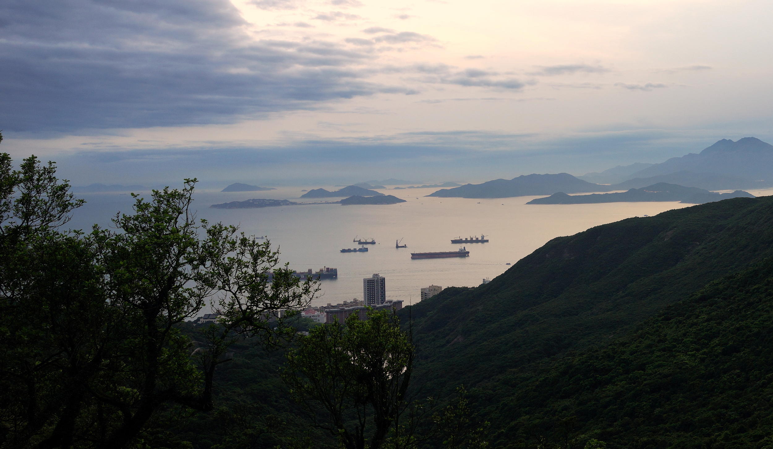 April 26th 2014 was cloudy but very clear - it is quite rare to see Cheung Chau Island (2 humps joined by a thin strip) and the other islands from the Peak.