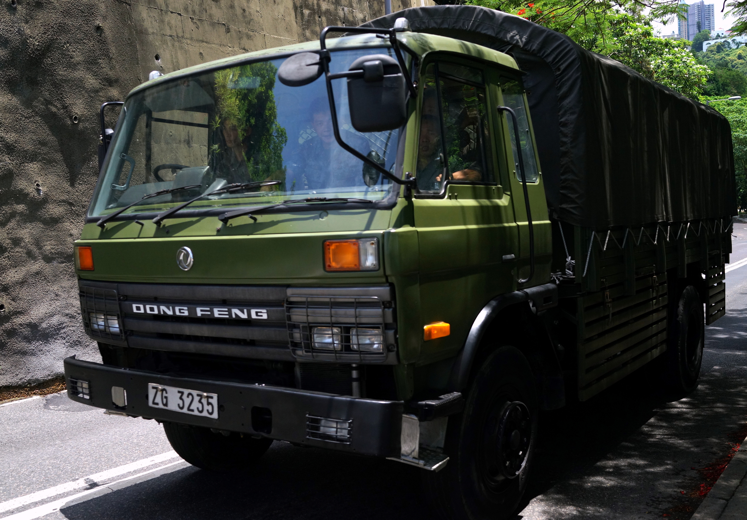 That's a pretty good death stare I am getting from a Chinese Soldier - it is not often you see a Mainland Chinese Army Truck in Hong Kong particularly in Deep Water Bay one of our most scenic spots!