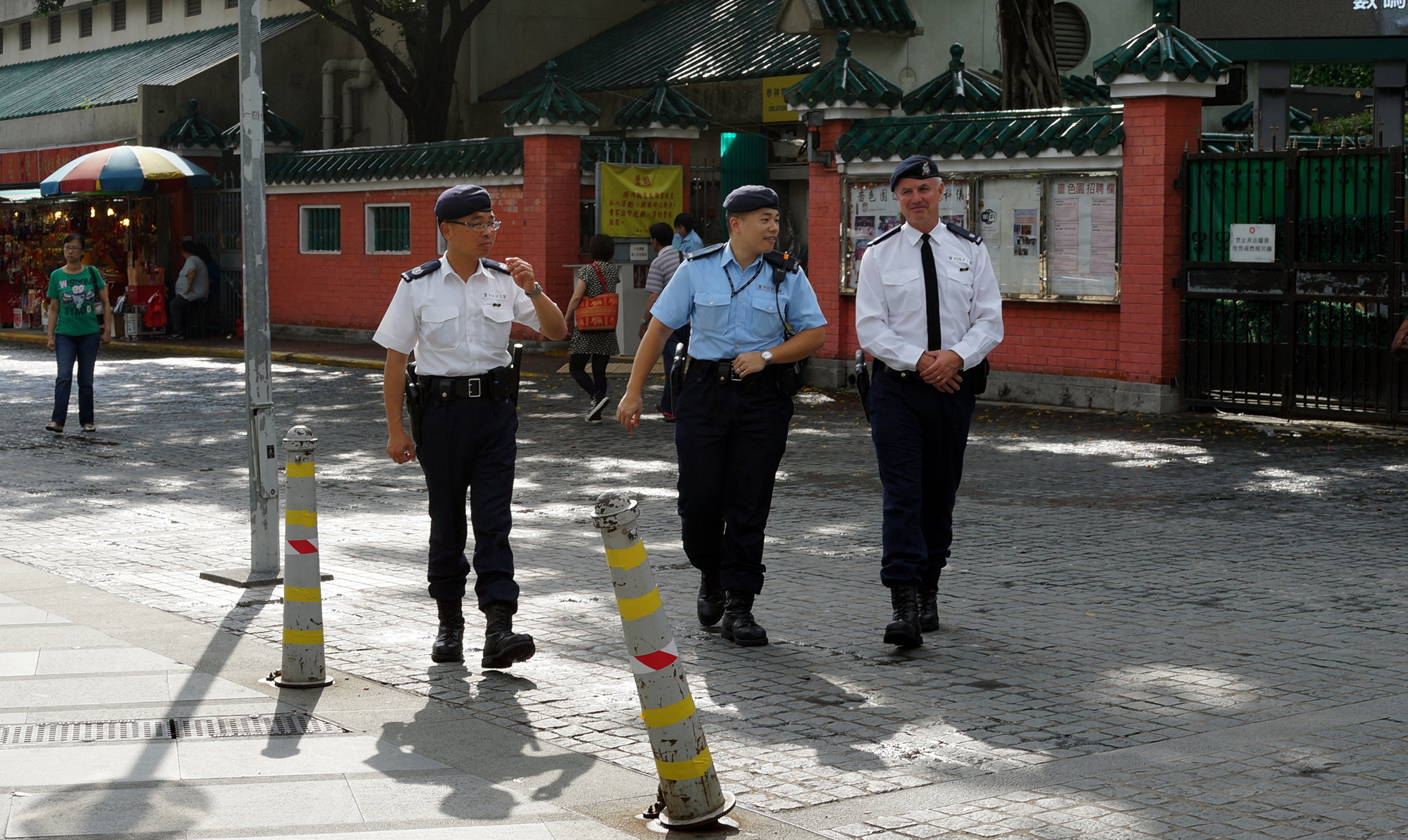 You very rarely see an expat copper on the streets of Hong Kong these days, I had a nice chat with this one who was Scottish and at Superintendent level - this section is the PTU section (Police Tactical Unit)