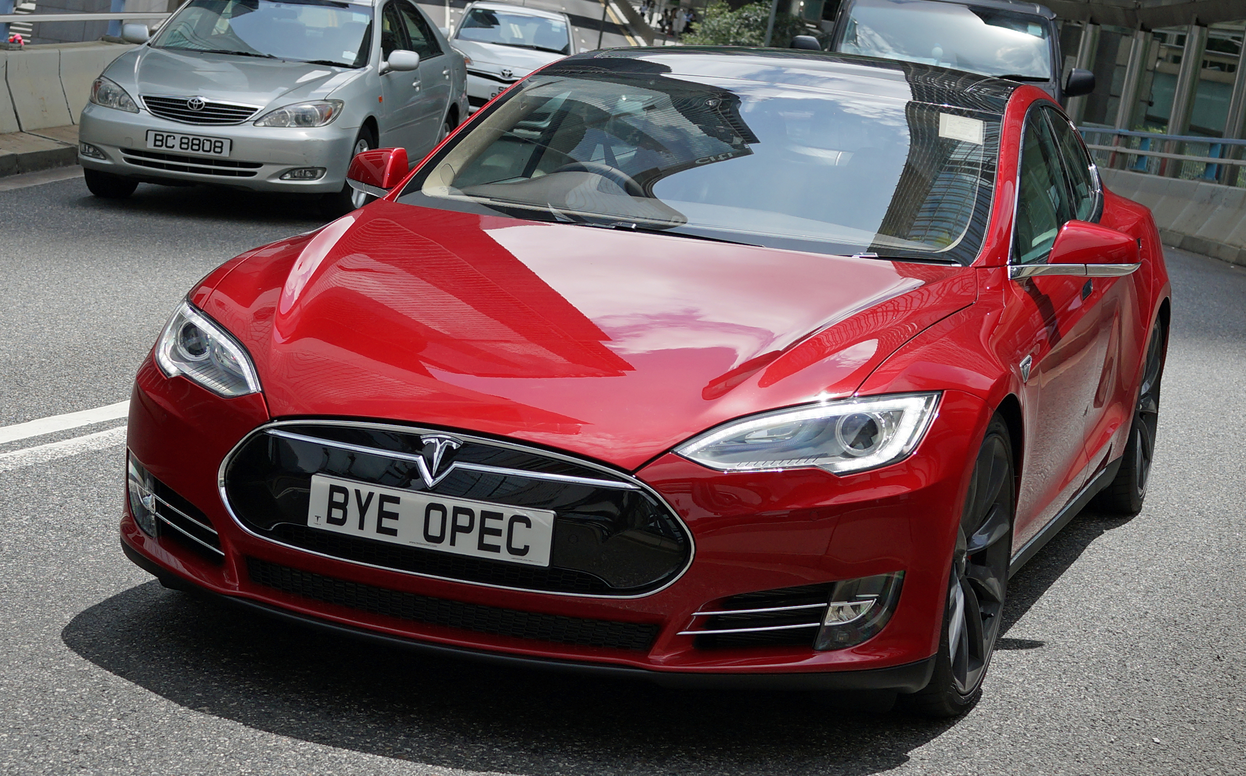 I admit that at first I was not a fan of the Tesla but I have to admit that it is growing on me - I have pretty much photographed every Tesla Car in Hong Kong ... as you can see it has a rather striking profile and I love this guys sense of humour with the number plate!!