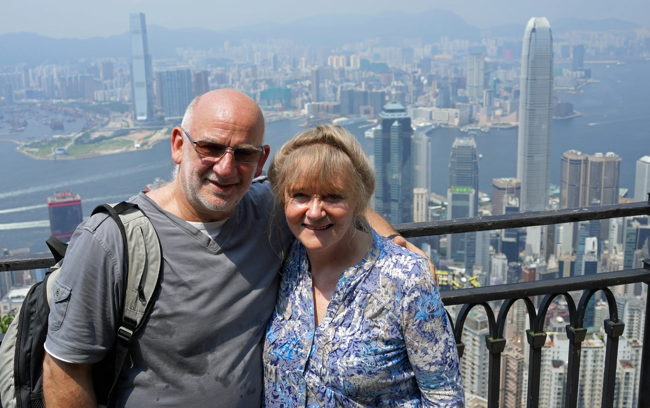 Meet Jill an eminent Doctor and Allan an eminent Artist from Scotland enjoying the brilliant views from my spot at Victoria Peak.
