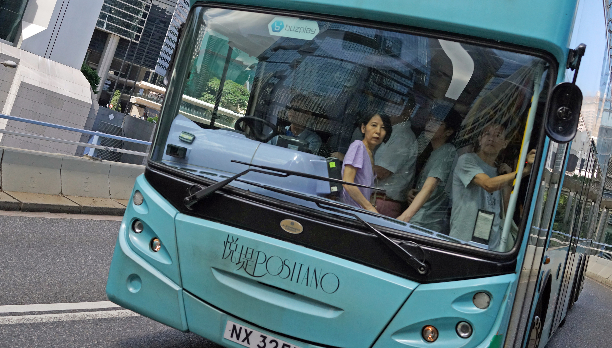 The woman on the bus - the always jam packed Bus No. 23