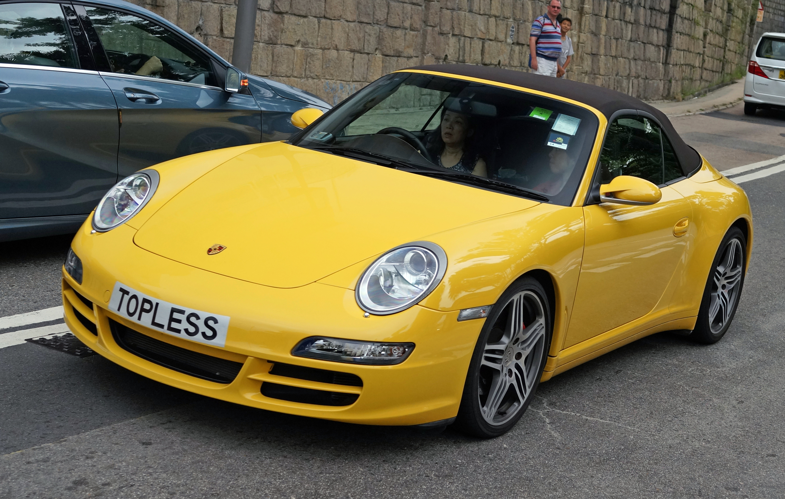 This is one of my most popular images ever on my Flickr site - a rather lovely yellow Porsche with the rather interesting number plate!