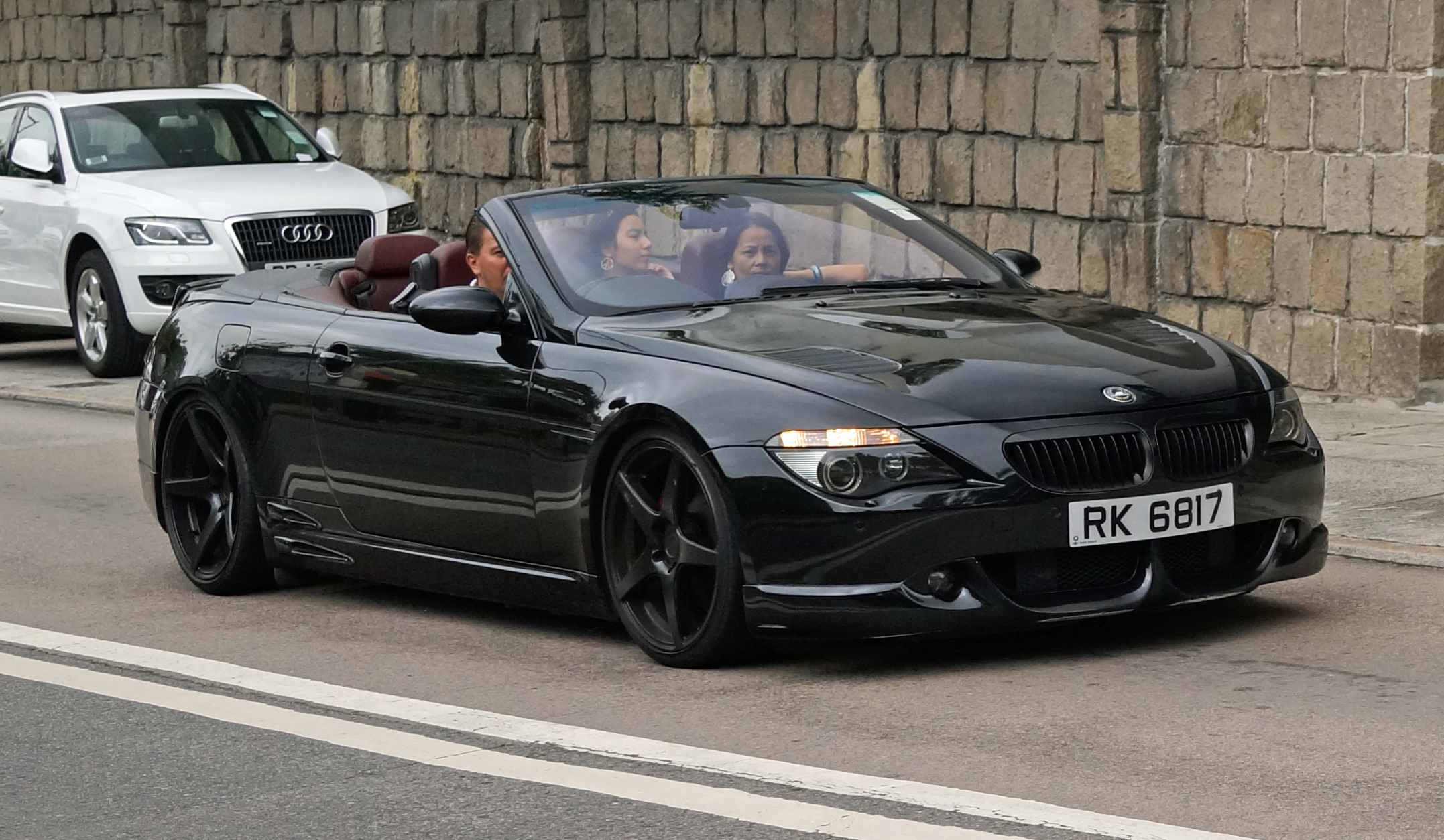 Oh my.... a rather splendid and expensive BMW roaring past the Hong Kong Country Club on the south side of Hong Kong Island - the guy was really motoring, I imagine the chicks were impressed!