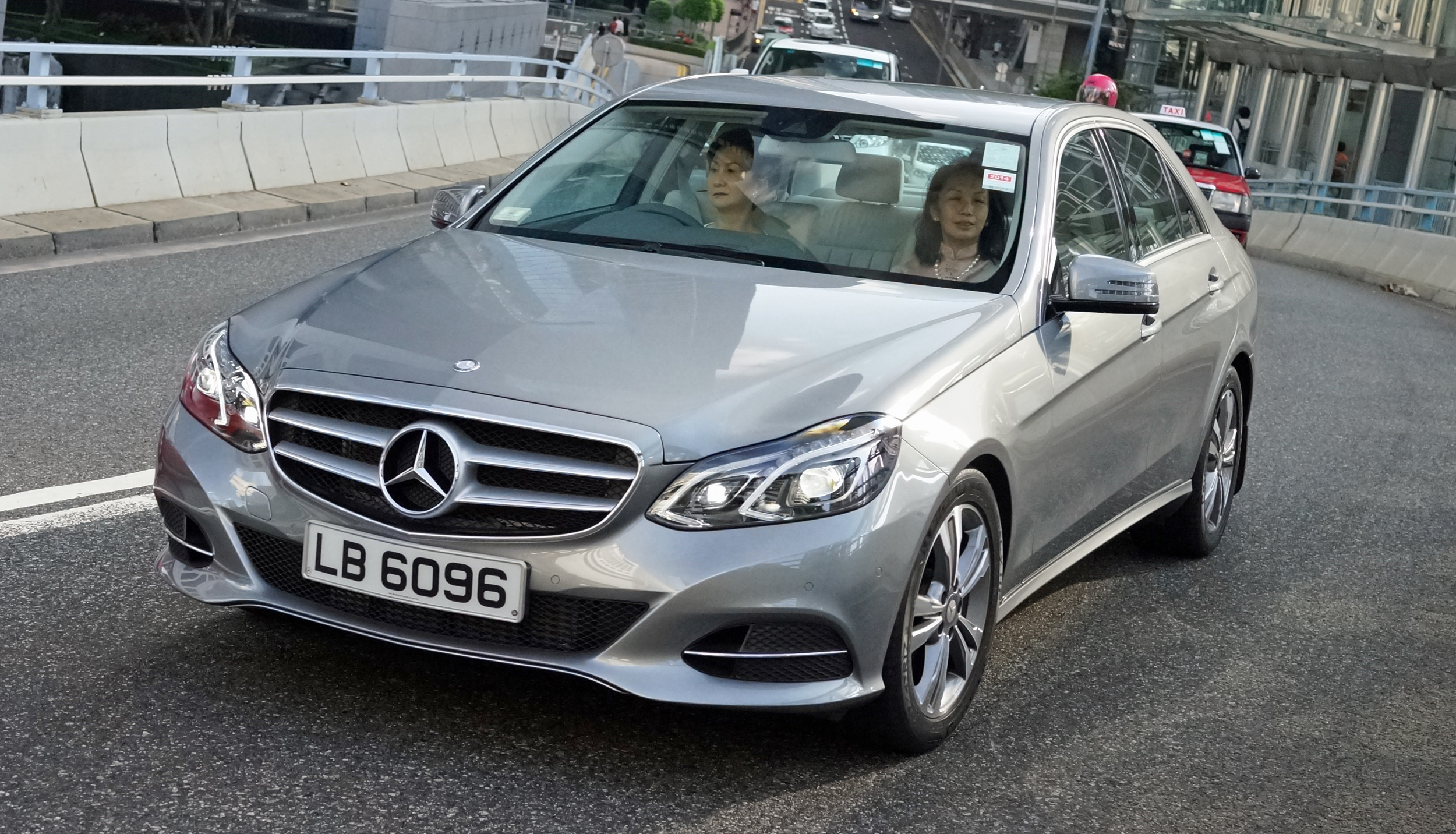 This is the more typical Hong Kong lady in the car (so to speak) they do look rather posh and refined and this model Mercedes is for them probably the family runabout!