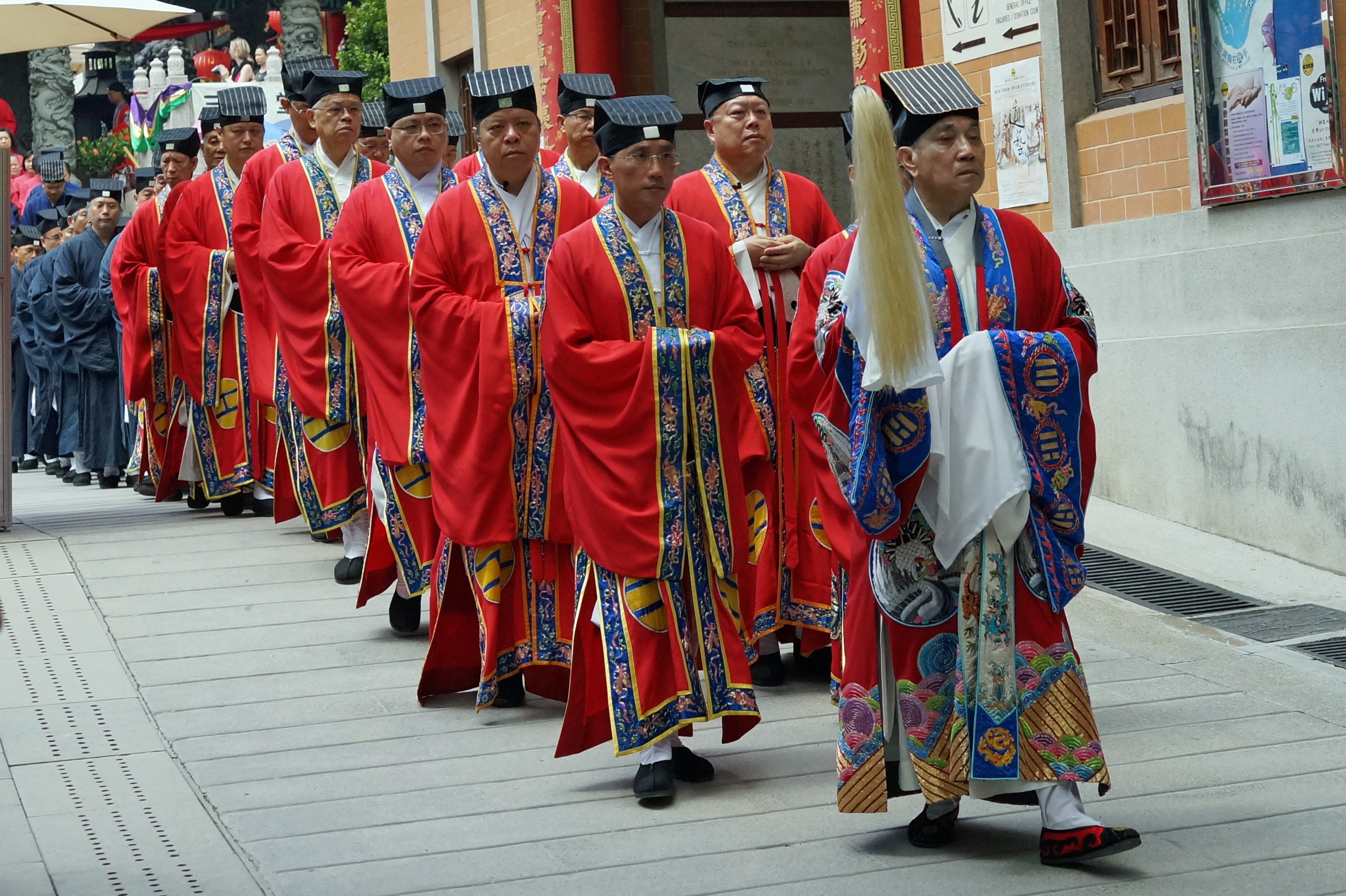 A very solemn ceremony at the Sik Sik Yuen Wong Tai Sin Temple - rather random but very colourful and those are Taoist Priests