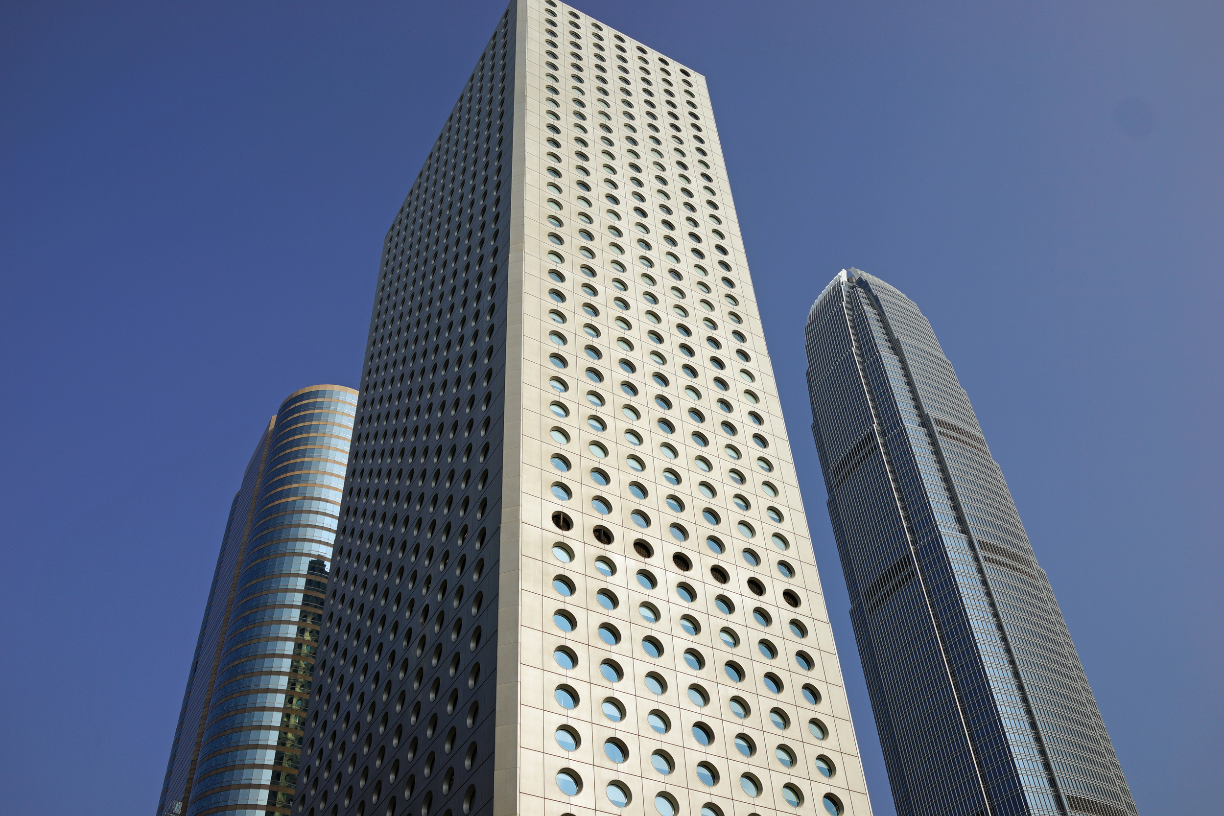 Jardine House in the centre, IFC 2 to the right and Exchange Square to the left - the hub of the financial district in Hong Kong.