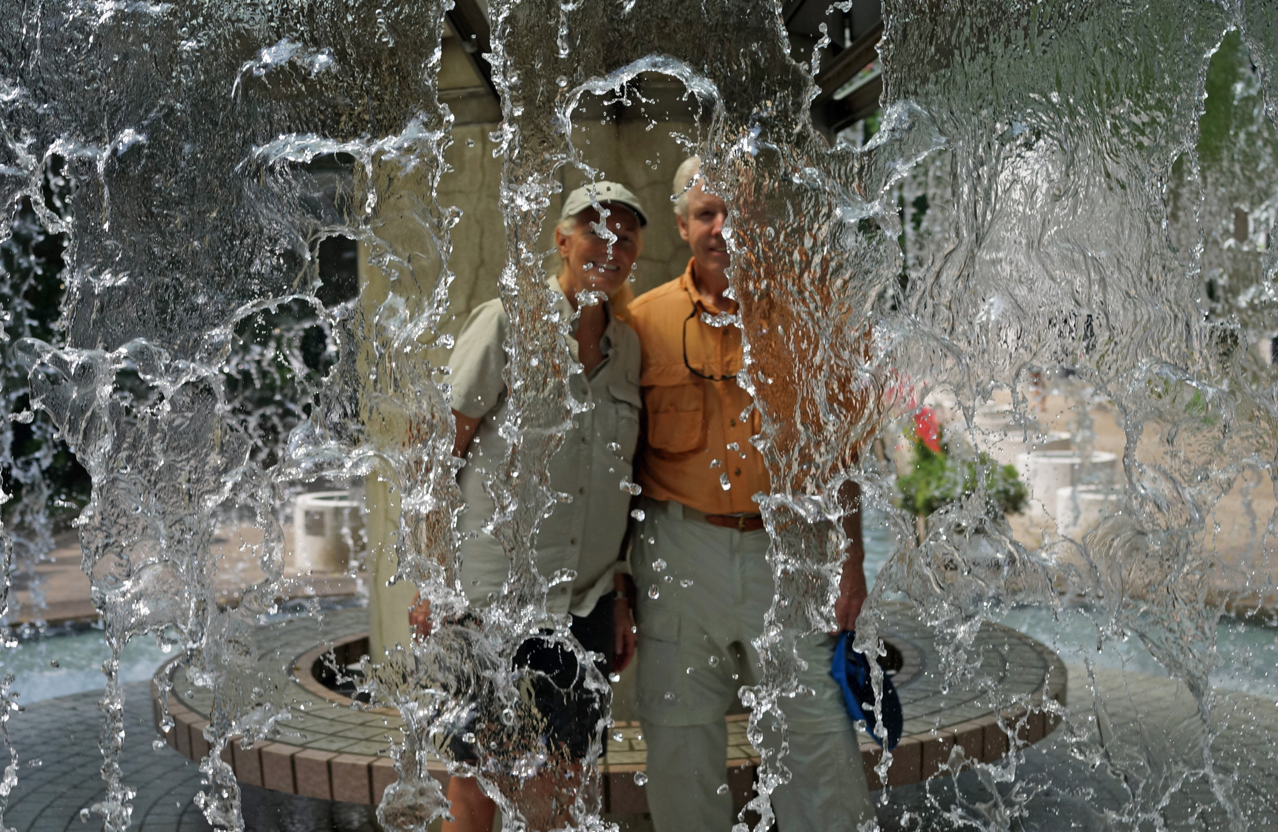 Tacie and Rol getting wet in Hong Kong Park