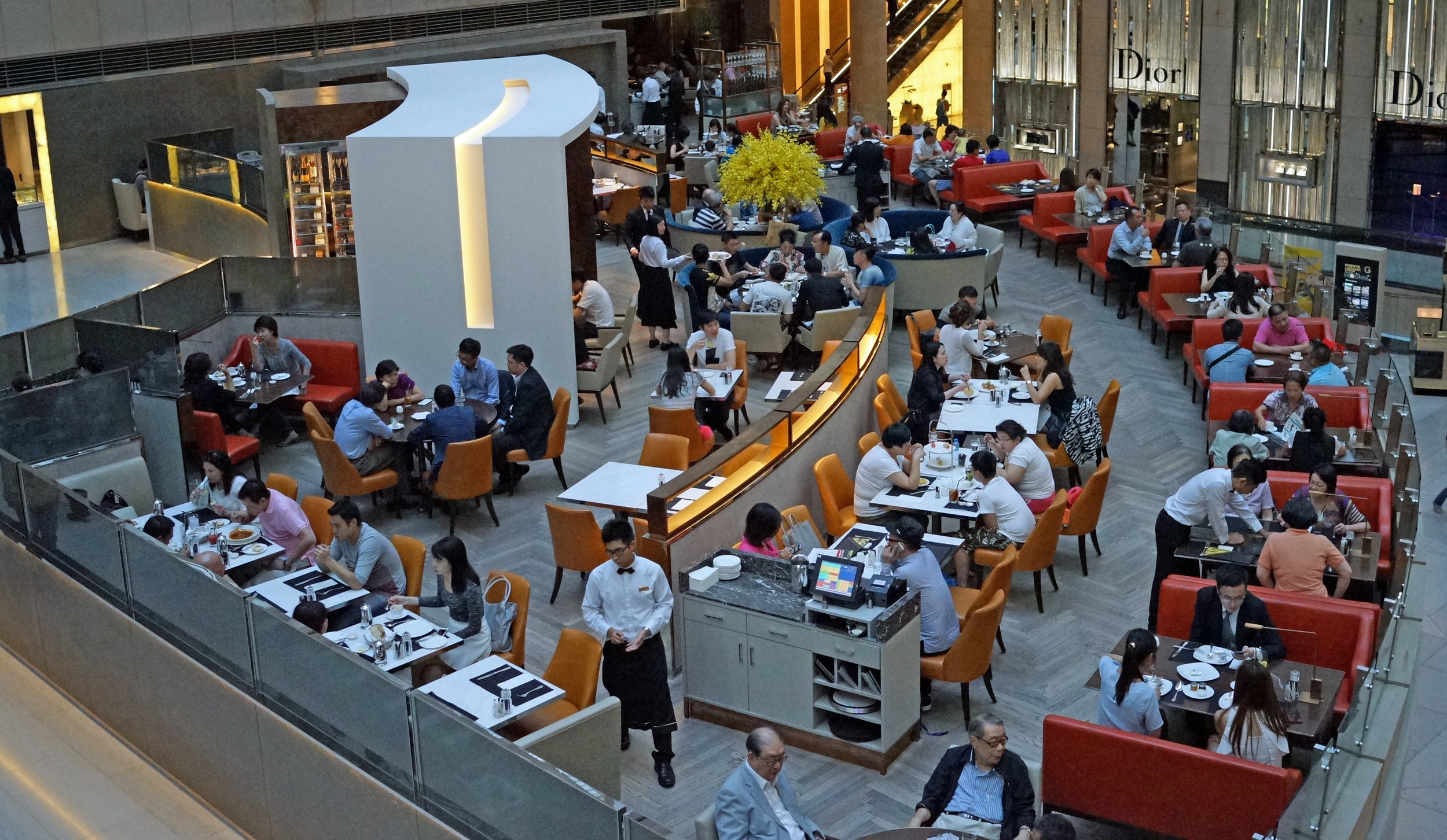 After months of renovation the quite famous Cafe Landmark has re - opened and as usual is full of rich folk.