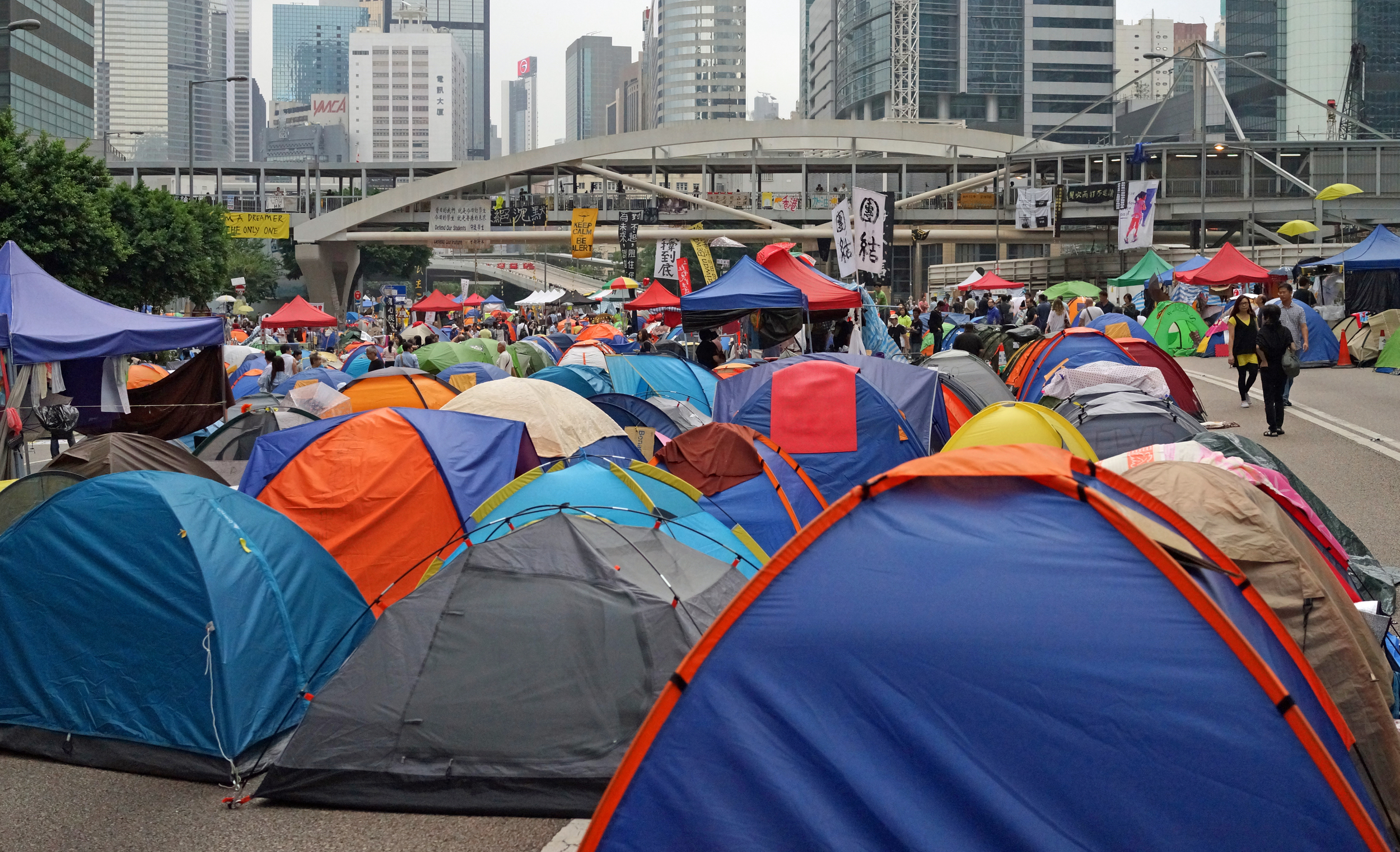 See comment above - this is the major road on Hong Kong Island, still blocked after 4 weeks, why does our Government tolerate this?? oh - most of the tents are empty and the place is like a big garbage dump - it is only a matter of time before the "students" start building concrete structures on the road.