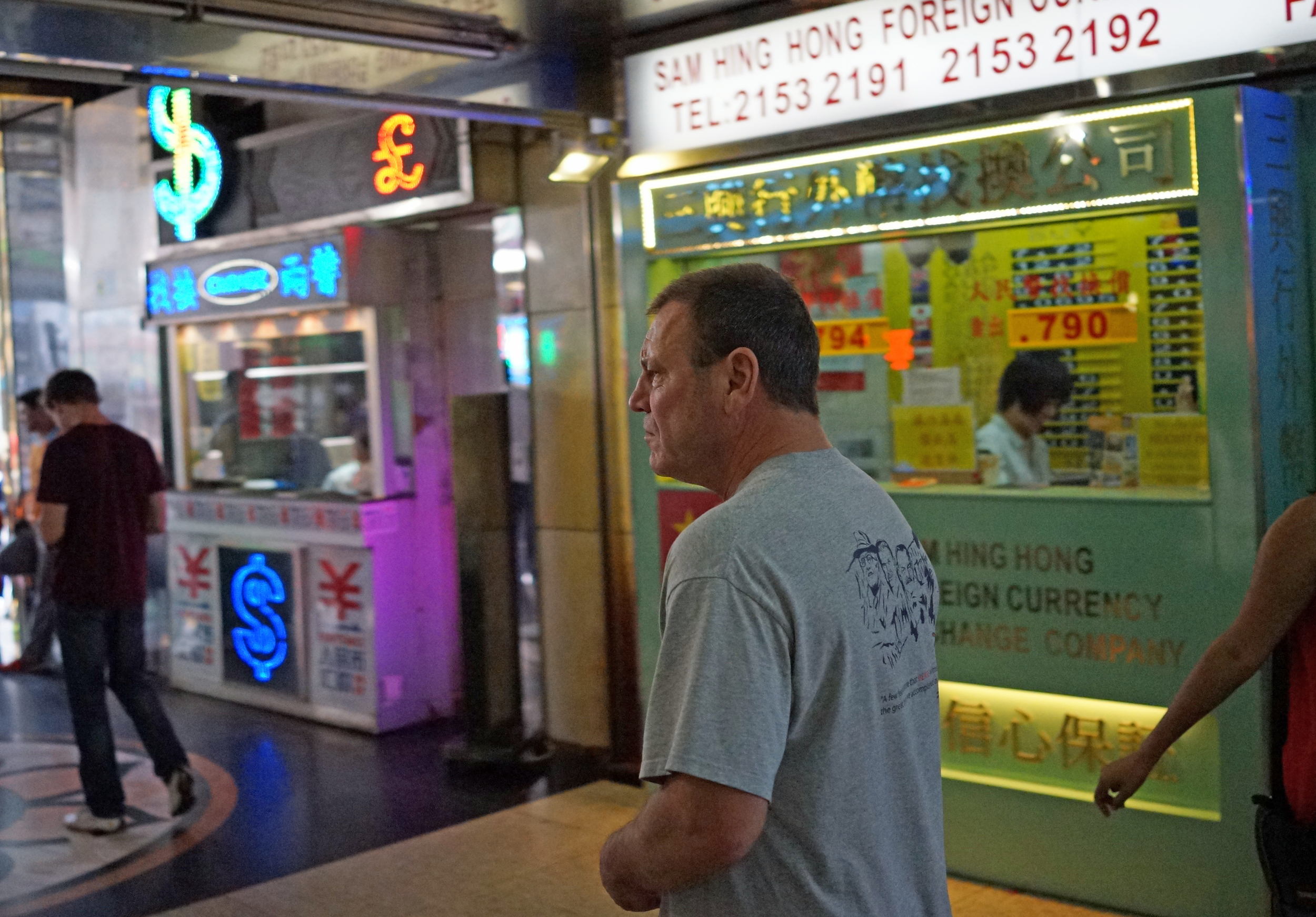 This chap was leaving Chungking Mansions which is perhaps Hong Kong's dodgiest building but it is however the best place in Hong Kong to change money.