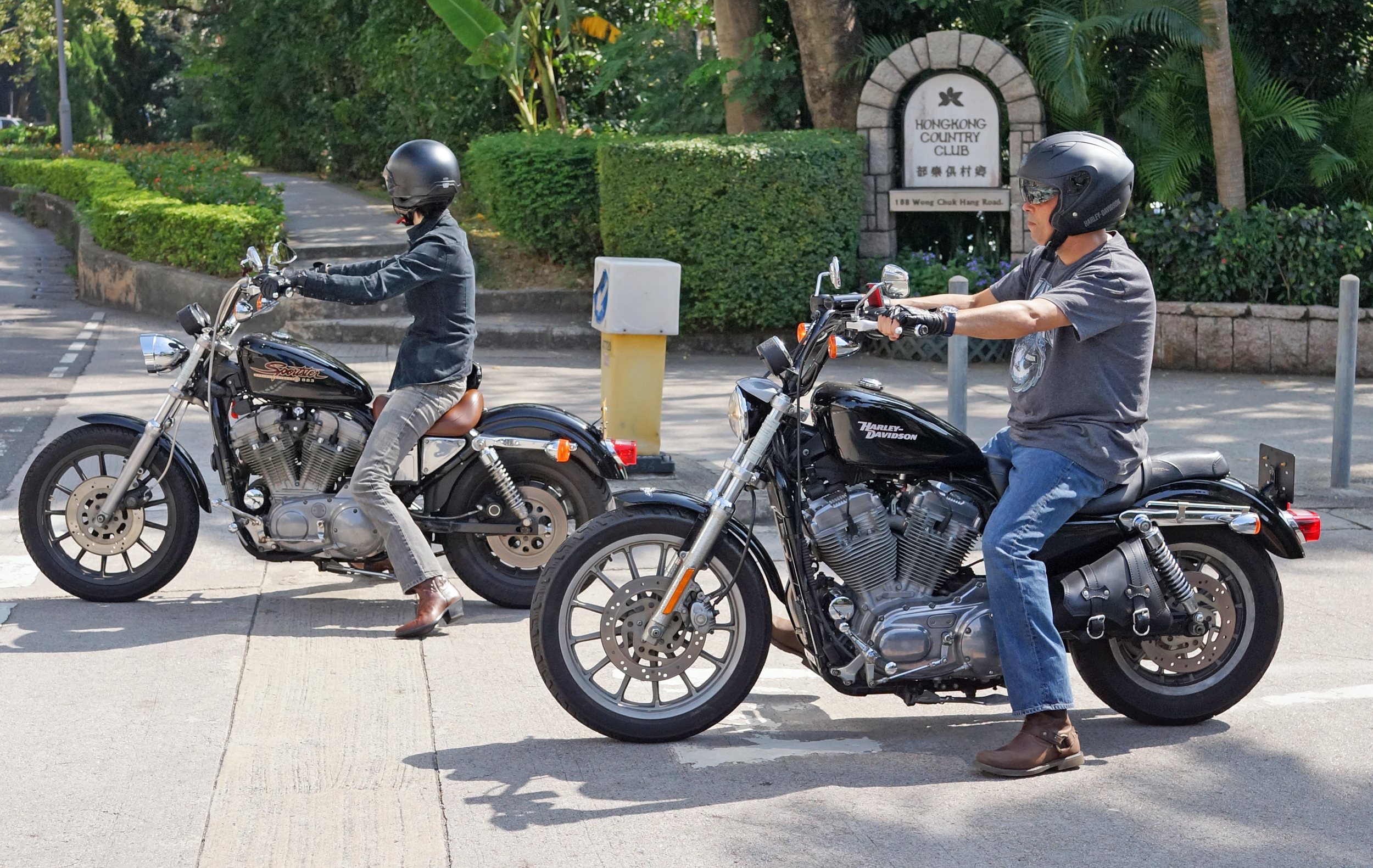 Mrs. Cool biker chick leads the way, her husband rides 6 paces behind.