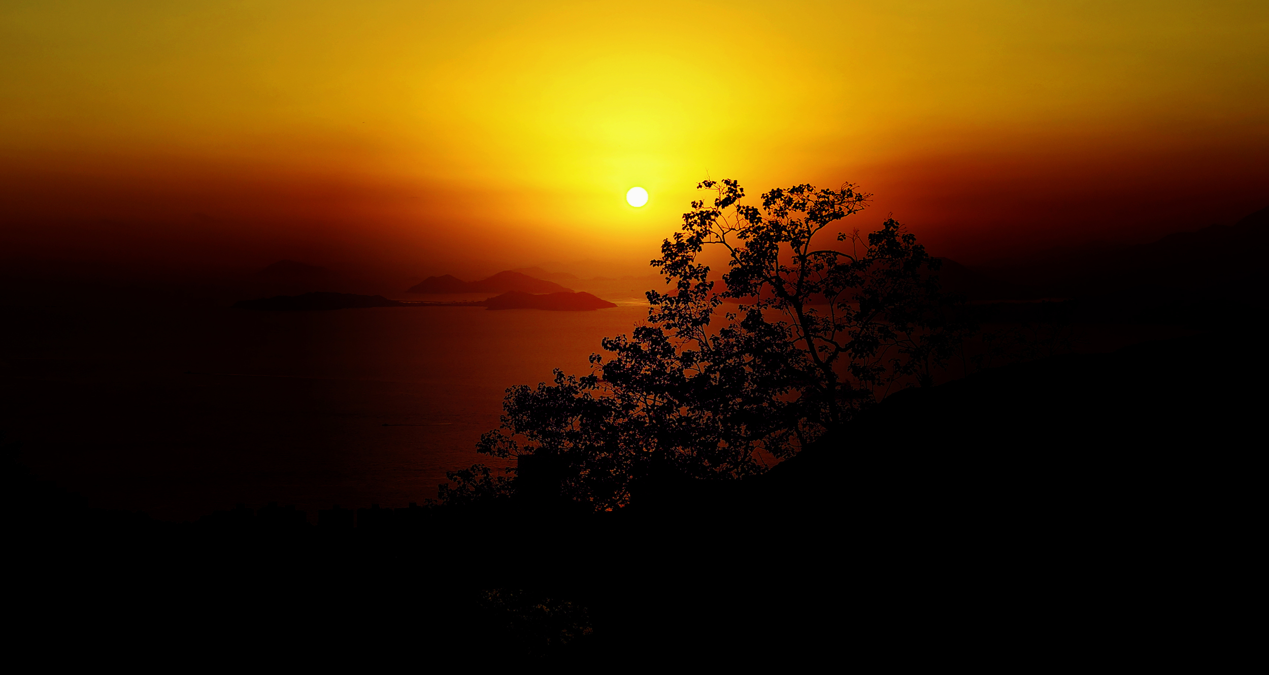 I got lucky today, I am not often at the Peak for sunset and I was just in time to catch this and it came out rather well... Cheung Chau Island is in the distance.