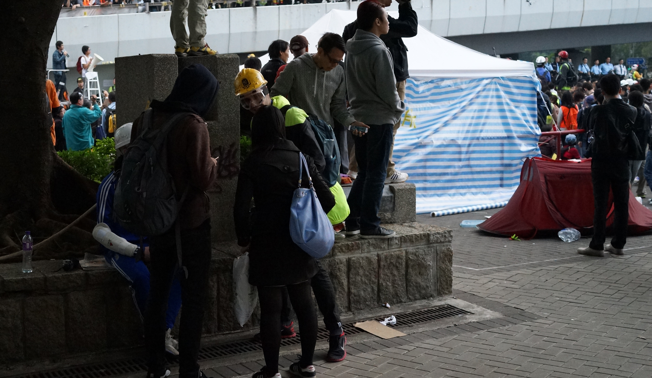 I had heard rumours of paid professional foreign agitators stirring up trouble and lo and behold 2 Russian chaps were there in full "body armour" - they were telling the 2 local students that they were going to resist the Police clearance as violently as possible.