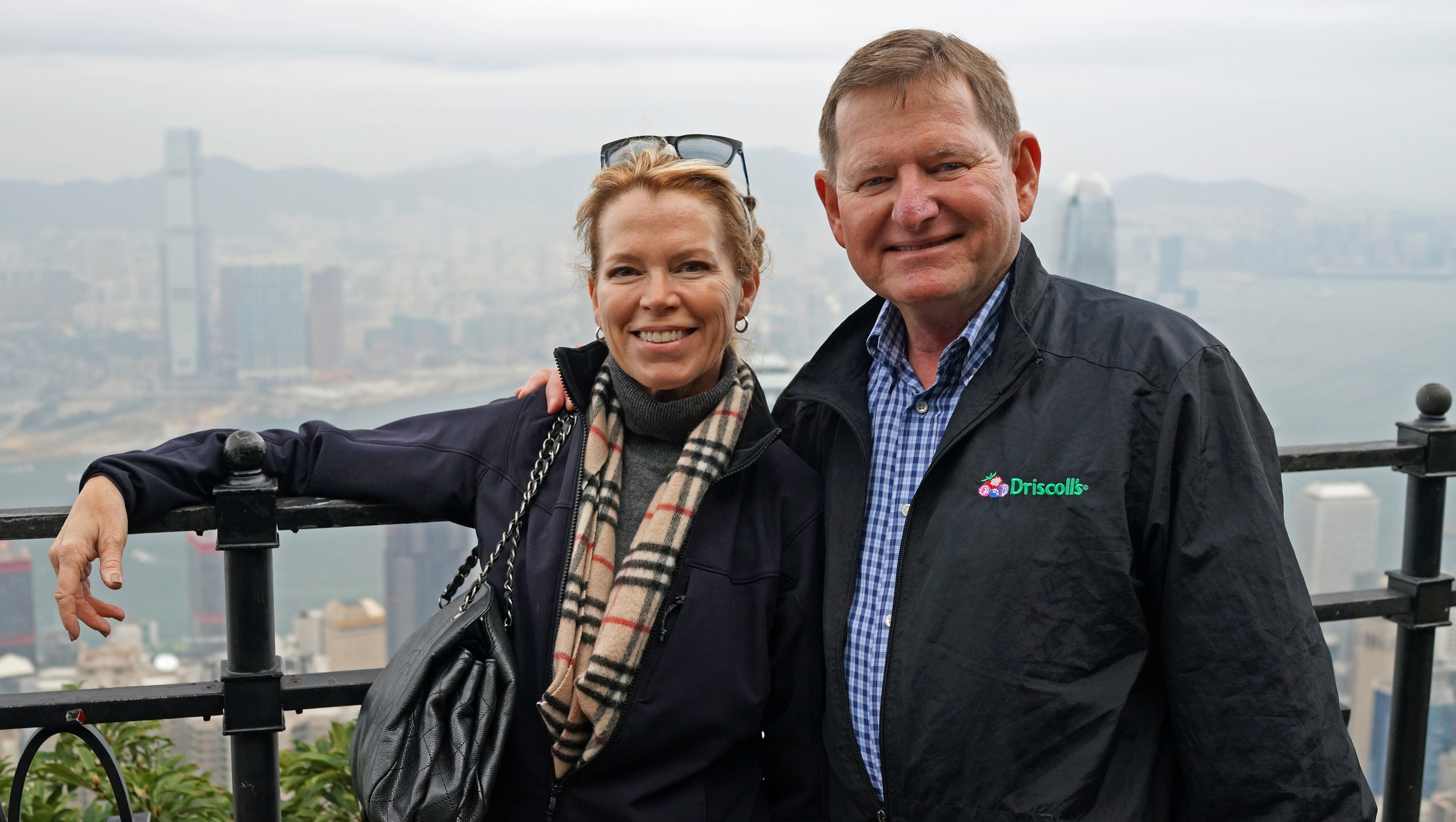 Pat and Katy enjoying a slightly hazy view of Hong Kong from my spot at the Peak